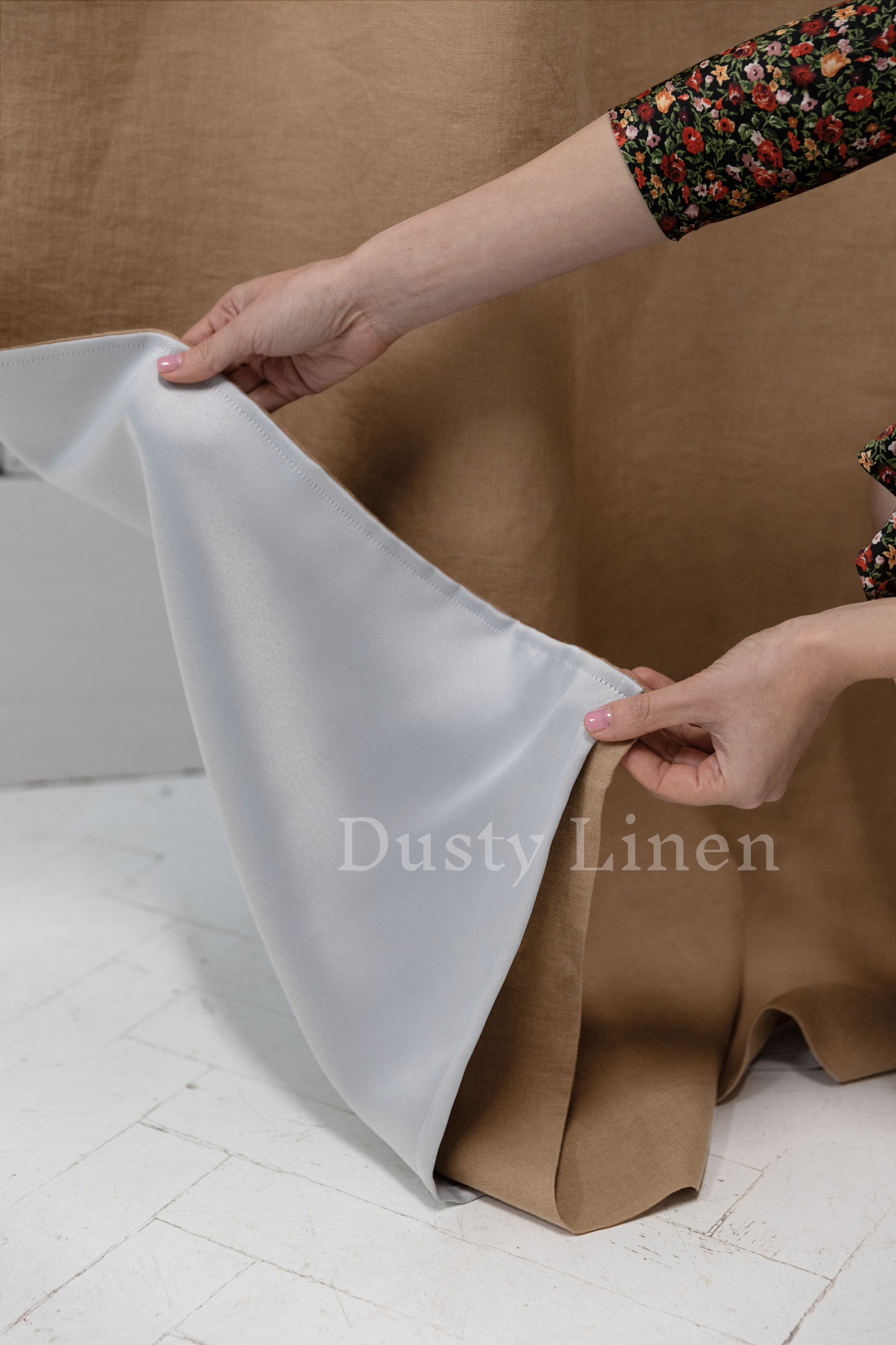a person holding a piece of white cloth
