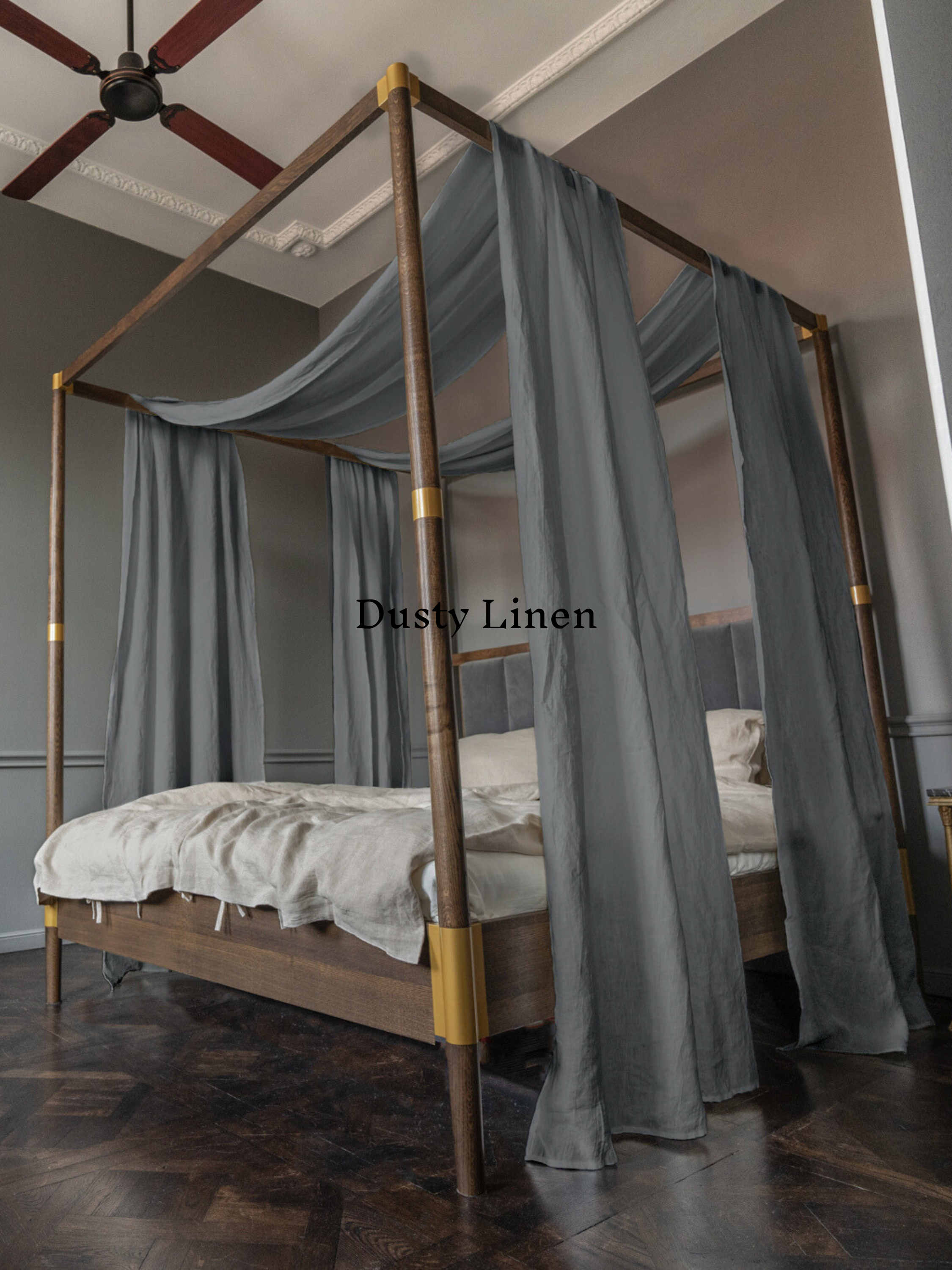 a bed with a canopy and curtains in a room