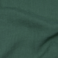 a green cloth with a white dot on it