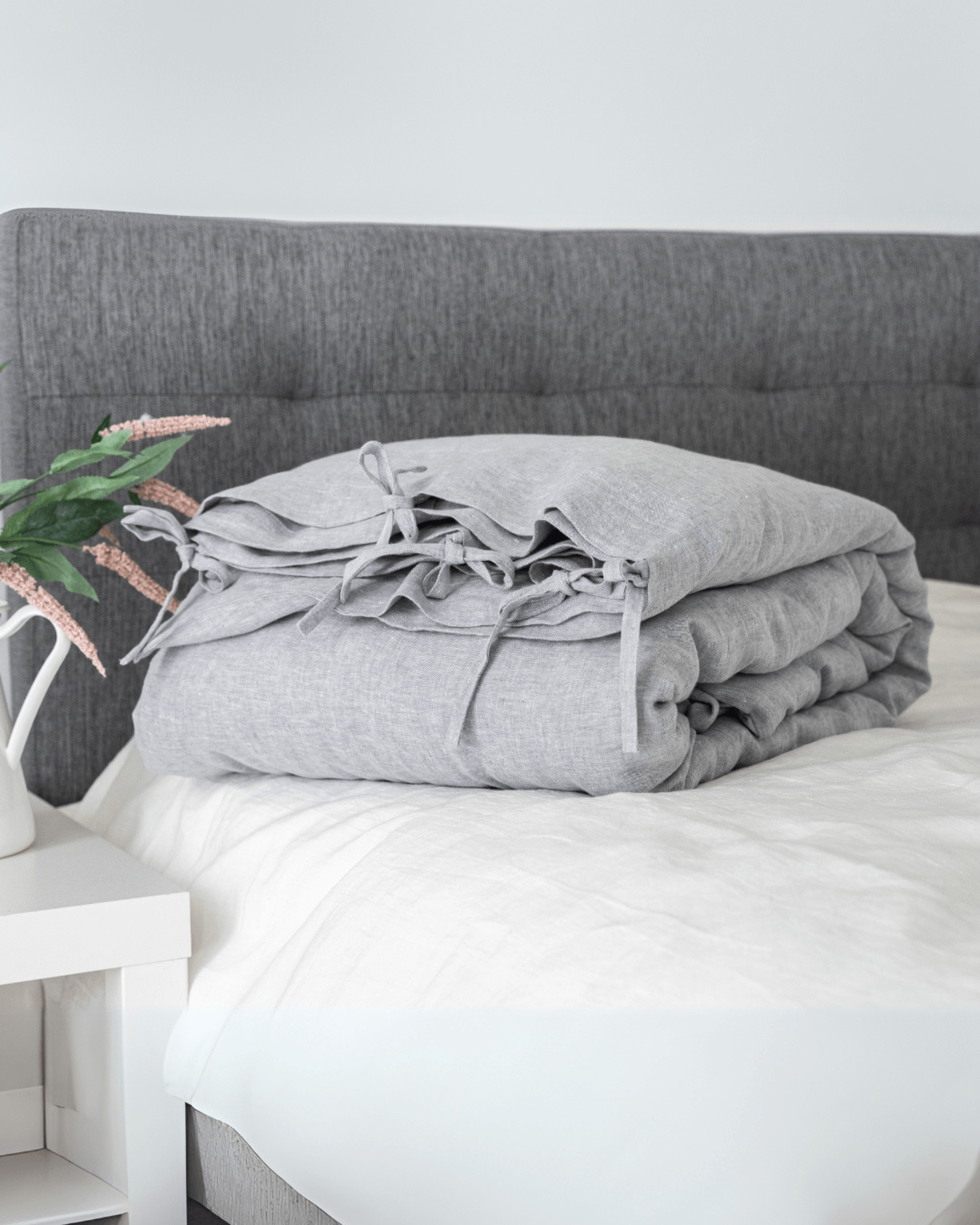 Minimalist linen pillowcases stacked on bed, EU, UK, US size bedding set