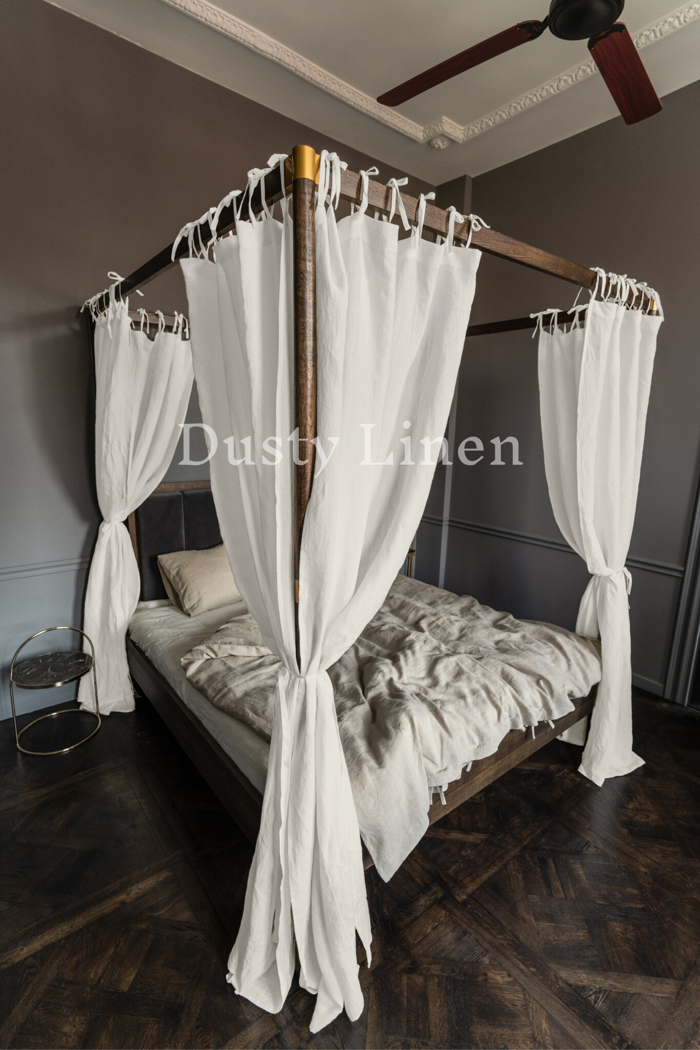 A bedroom with Off White color canopy bed drapes with ties in boho style. Made by DustyLinen