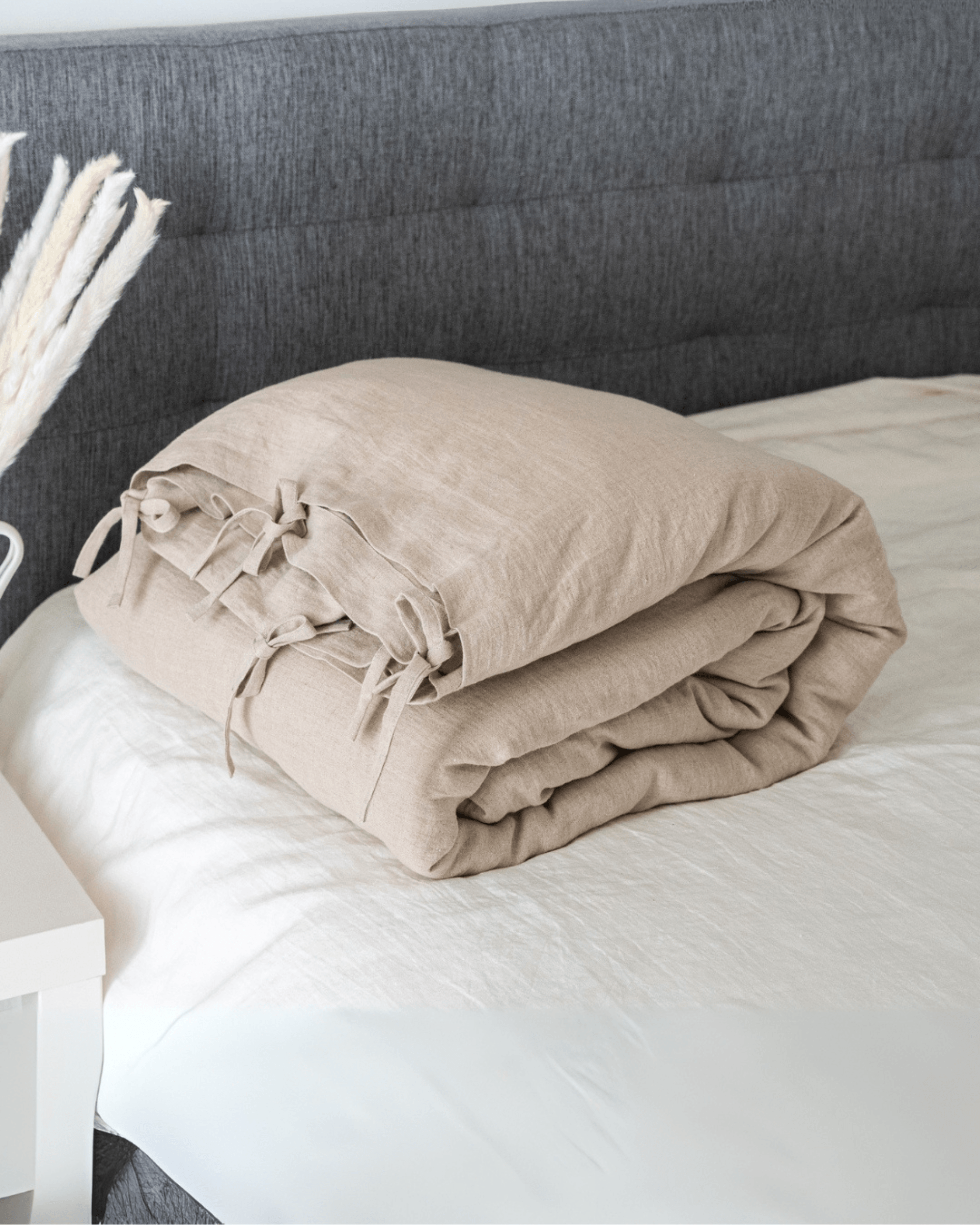 Minimalist linen bedding set close-up, bottom closure detail, EU, UK, US size