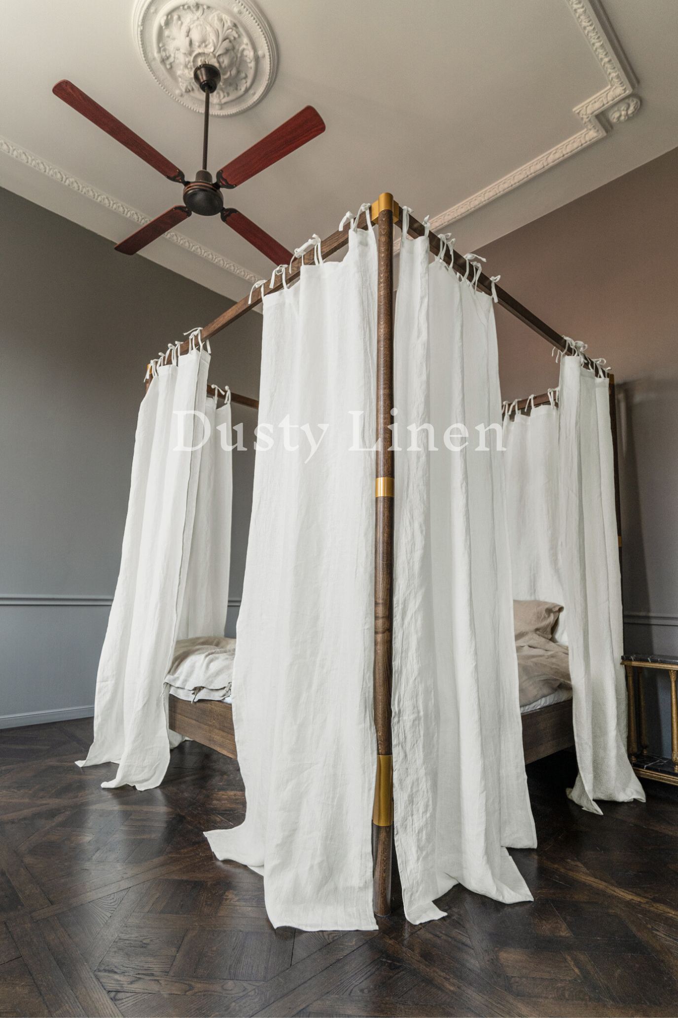 White color a canopy bed with white drapes and a ceiling fan Dusty Linen