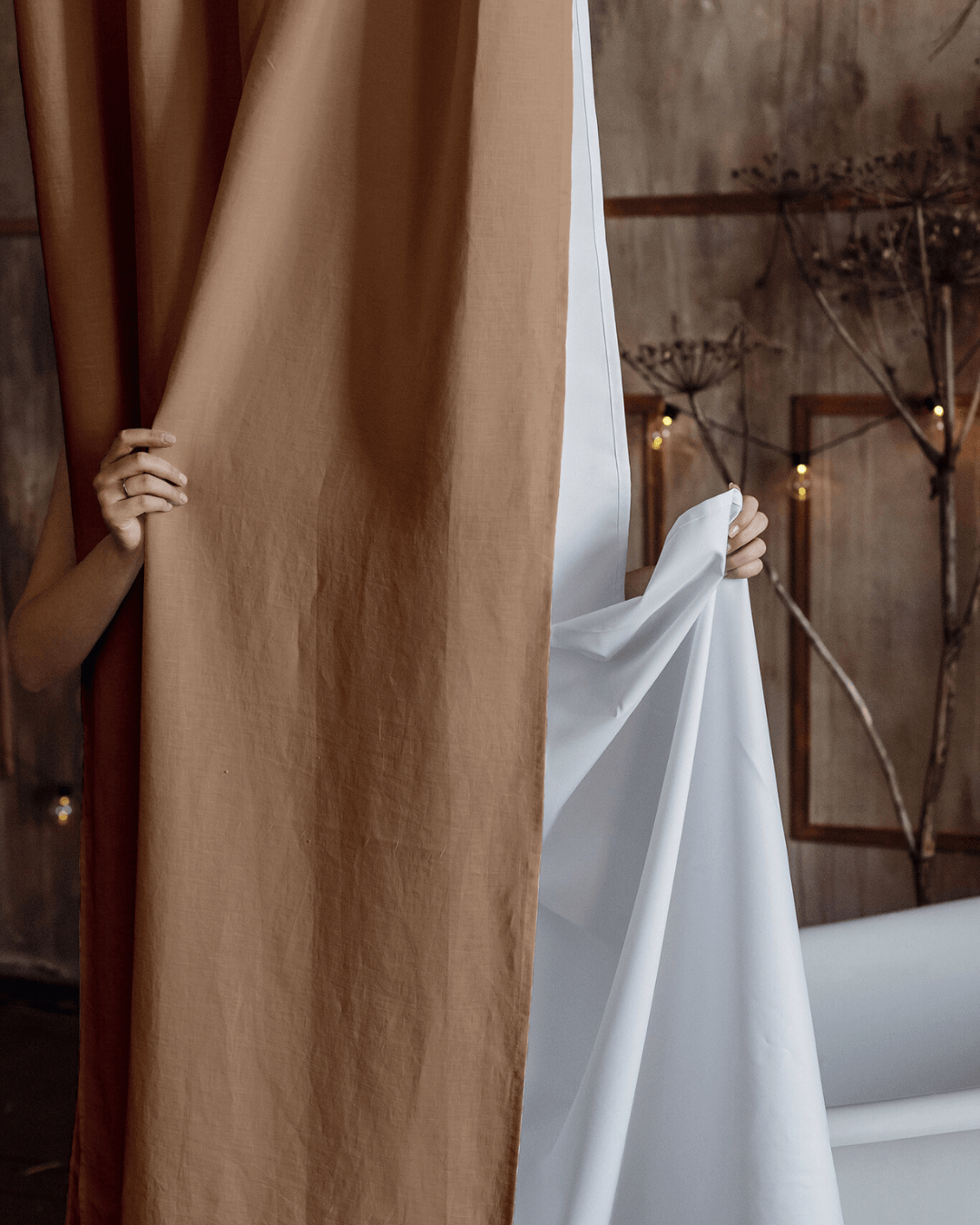Camel brown waterproof shower curtain in rustic bathroom with freestanding tub