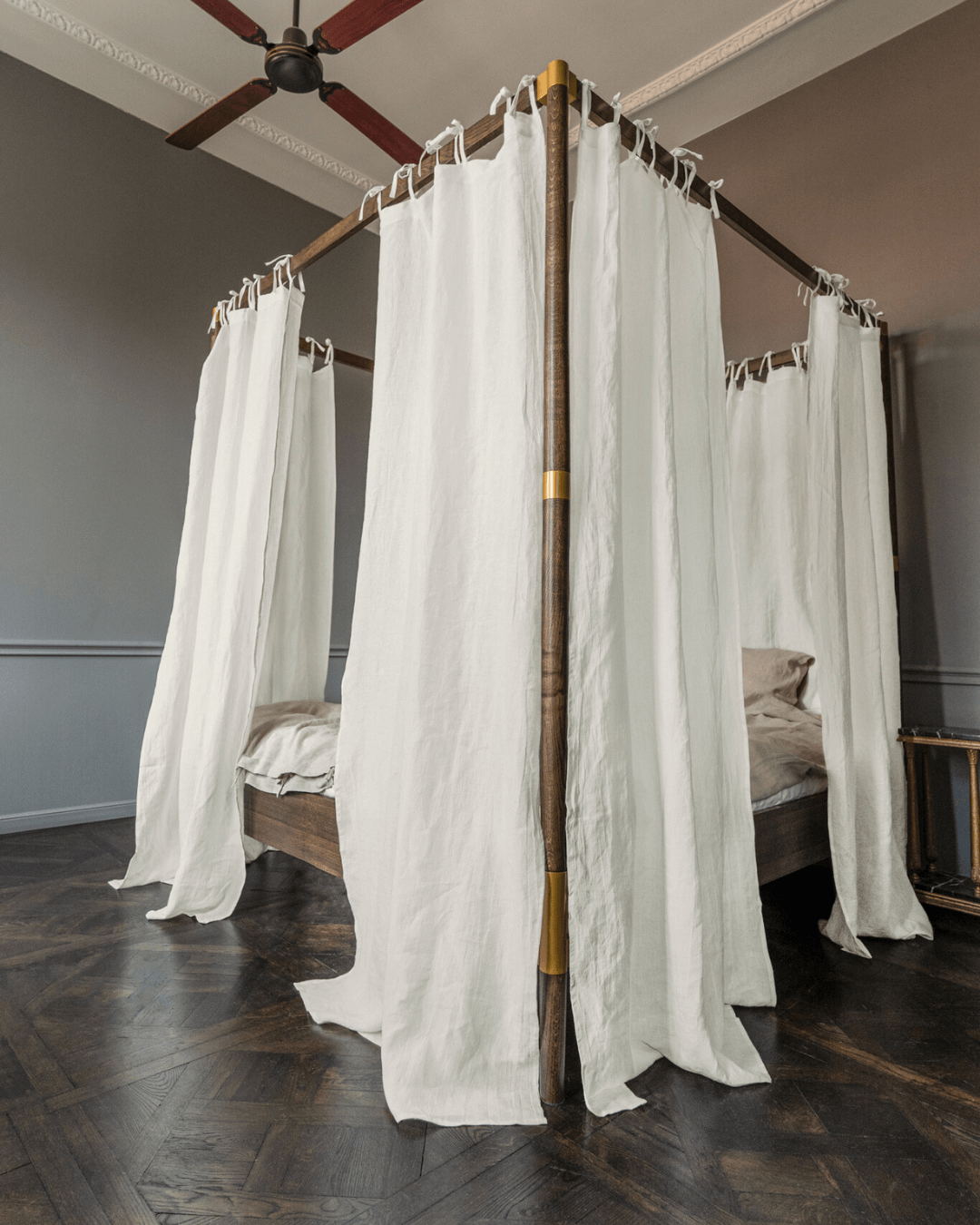 Close-up of tie heading detail on off white linen canopy curtains