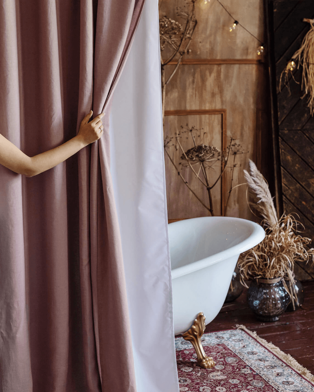Dusty rose weighted shower curtain feel in styled bathroom interior