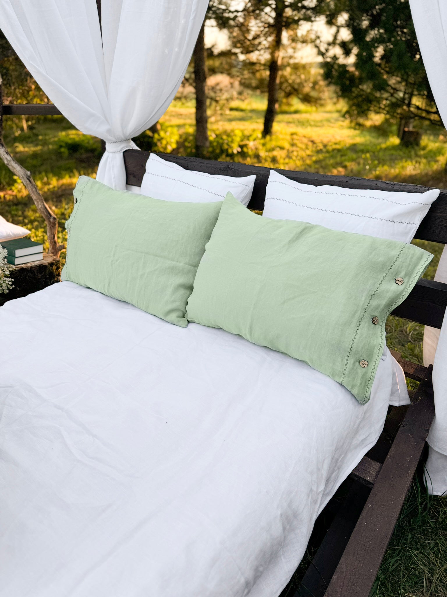 Black embroidered linen bedding set layered on bed, US, EU, UK size