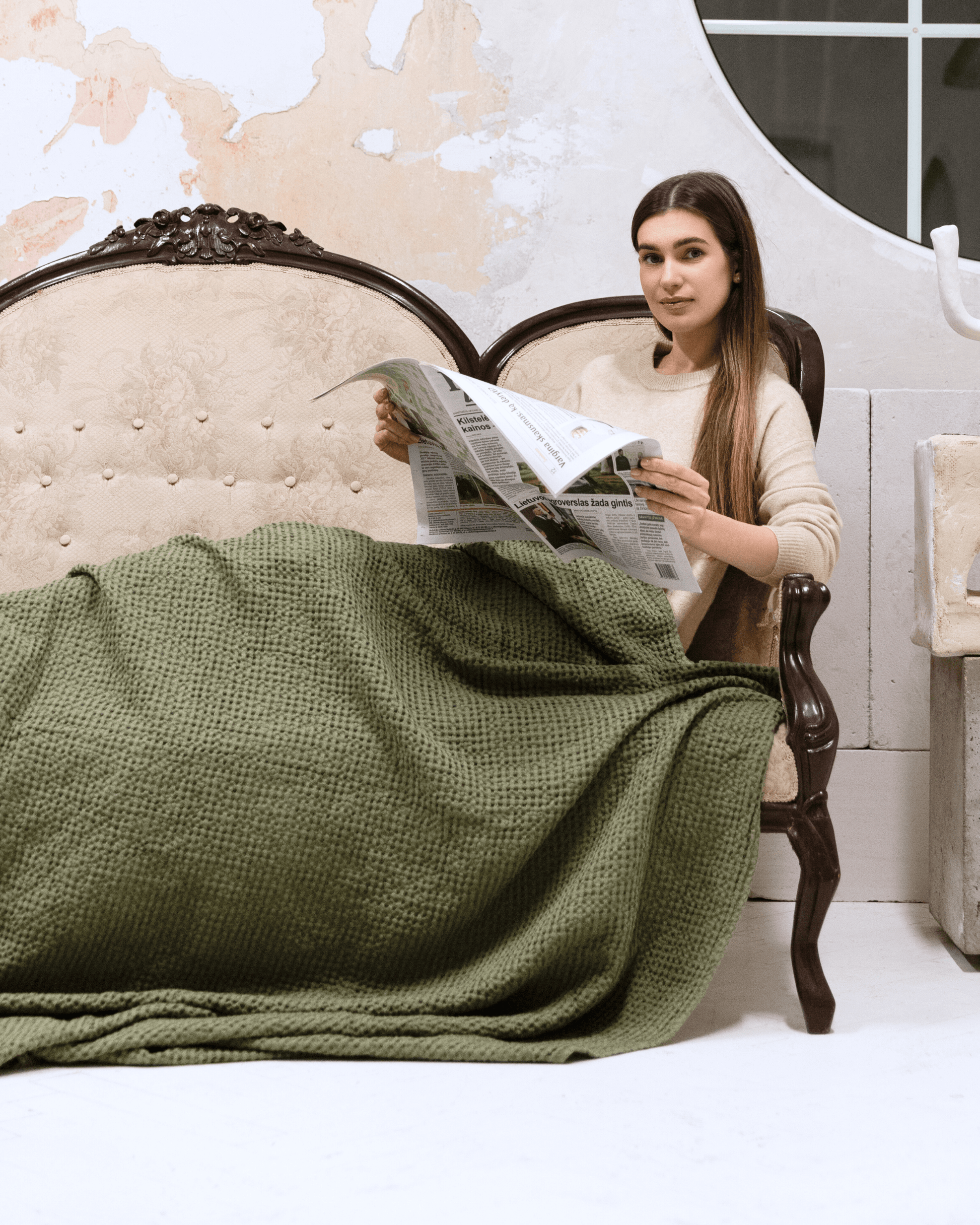 Large waffle blanket khaki green — woman reading with blanket draped over lap