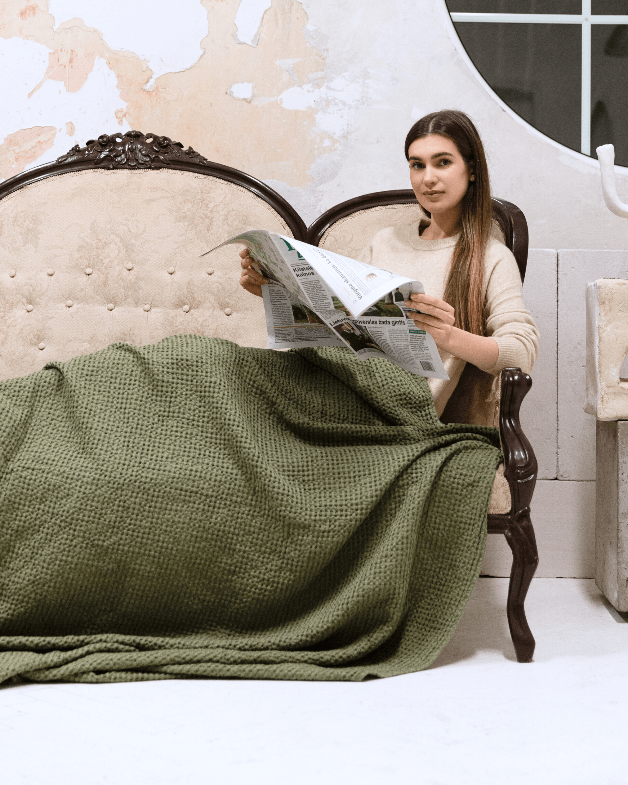 Large waffle blanket khaki green — woman reading with blanket draped over lap