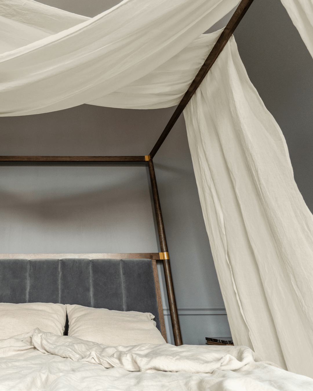 Linen canopy shawl draped on four-poster bed, scarf-style, front view