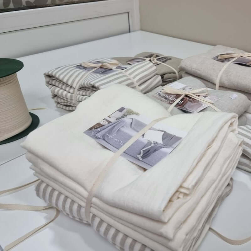 Linen detail, flat lay on white surface