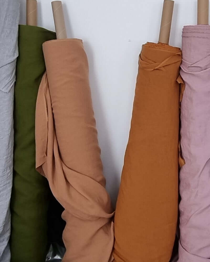 Camel brown and warm-tone linen fabric swatches