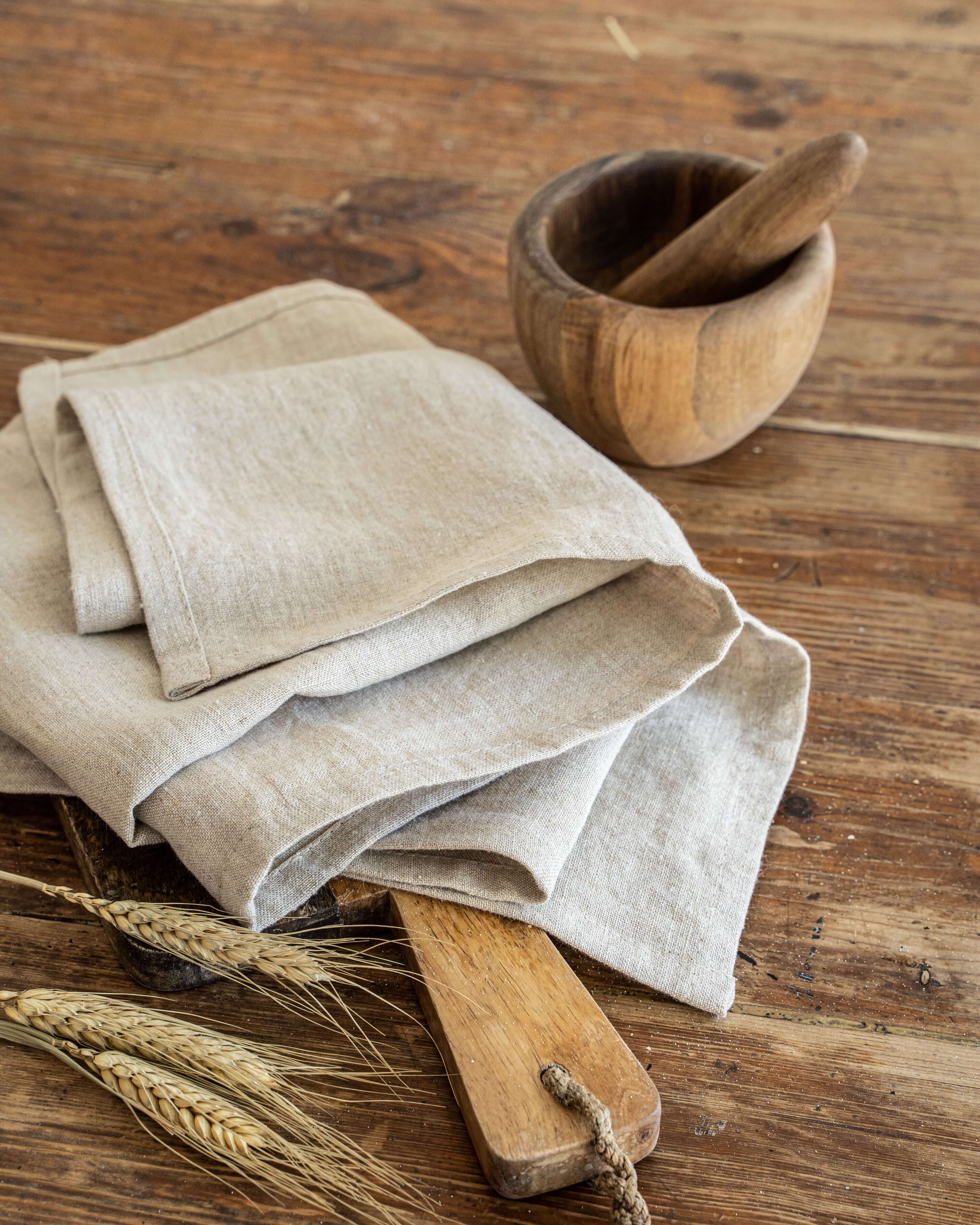 Linen tea towel styled with rustic kitchen elements