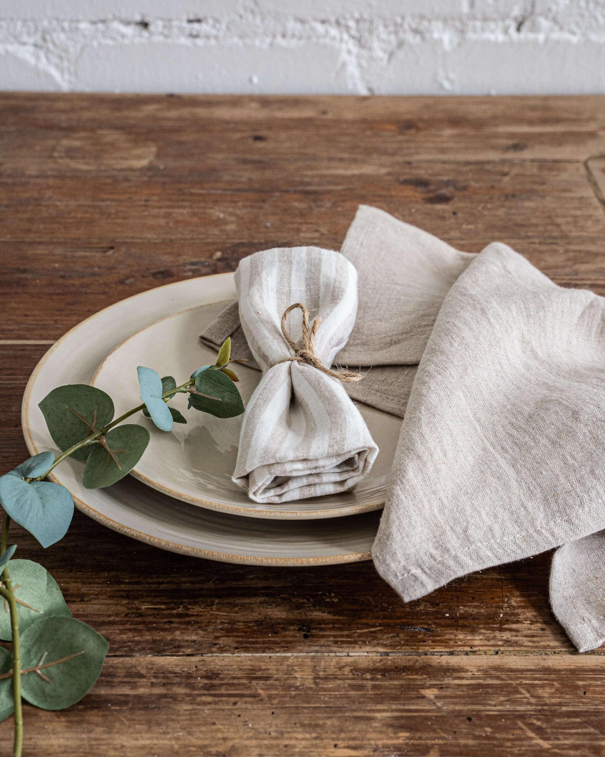 Linen napkin with decorative fold on table setting