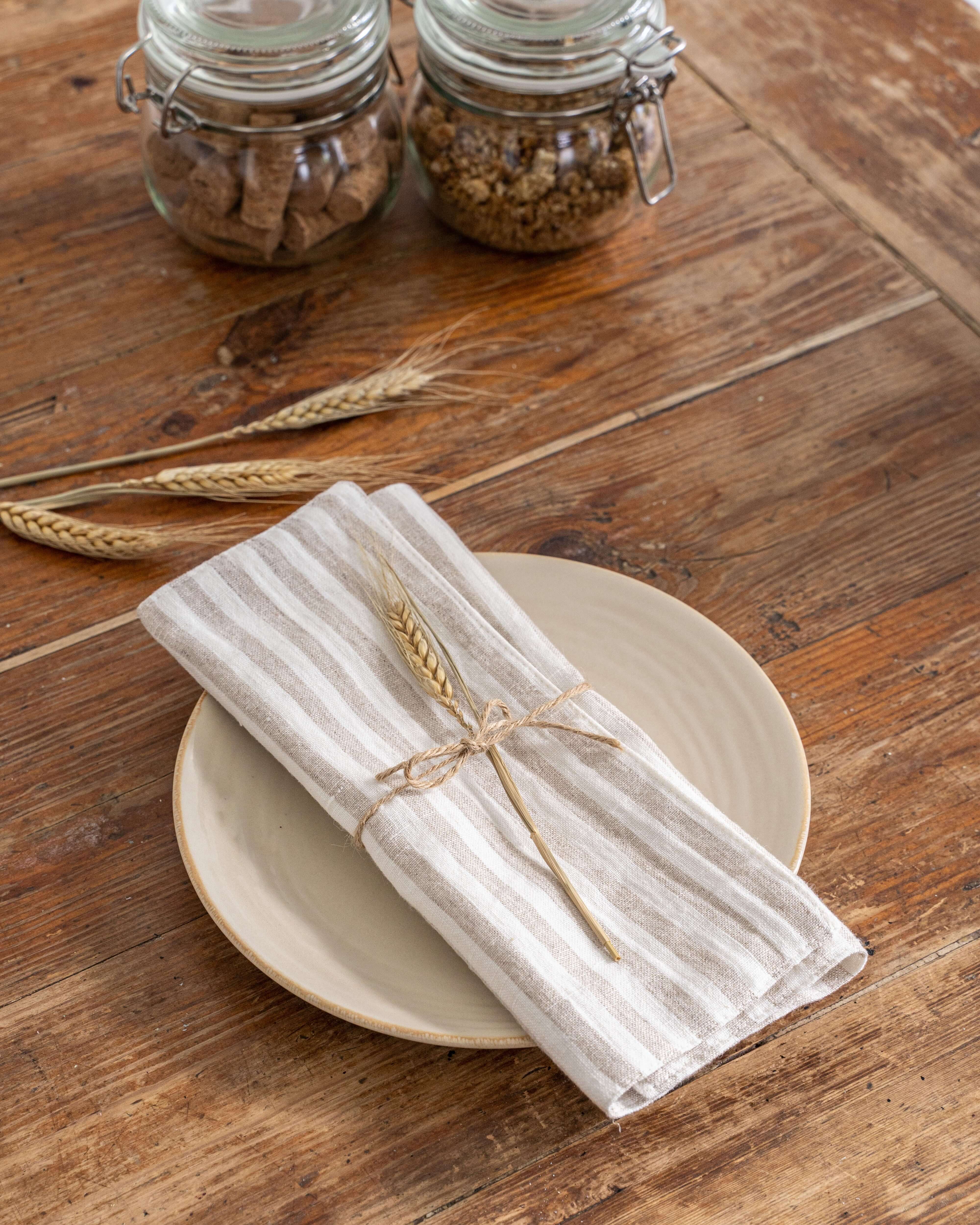 Linen placemat with coffee cup, morning table setting
