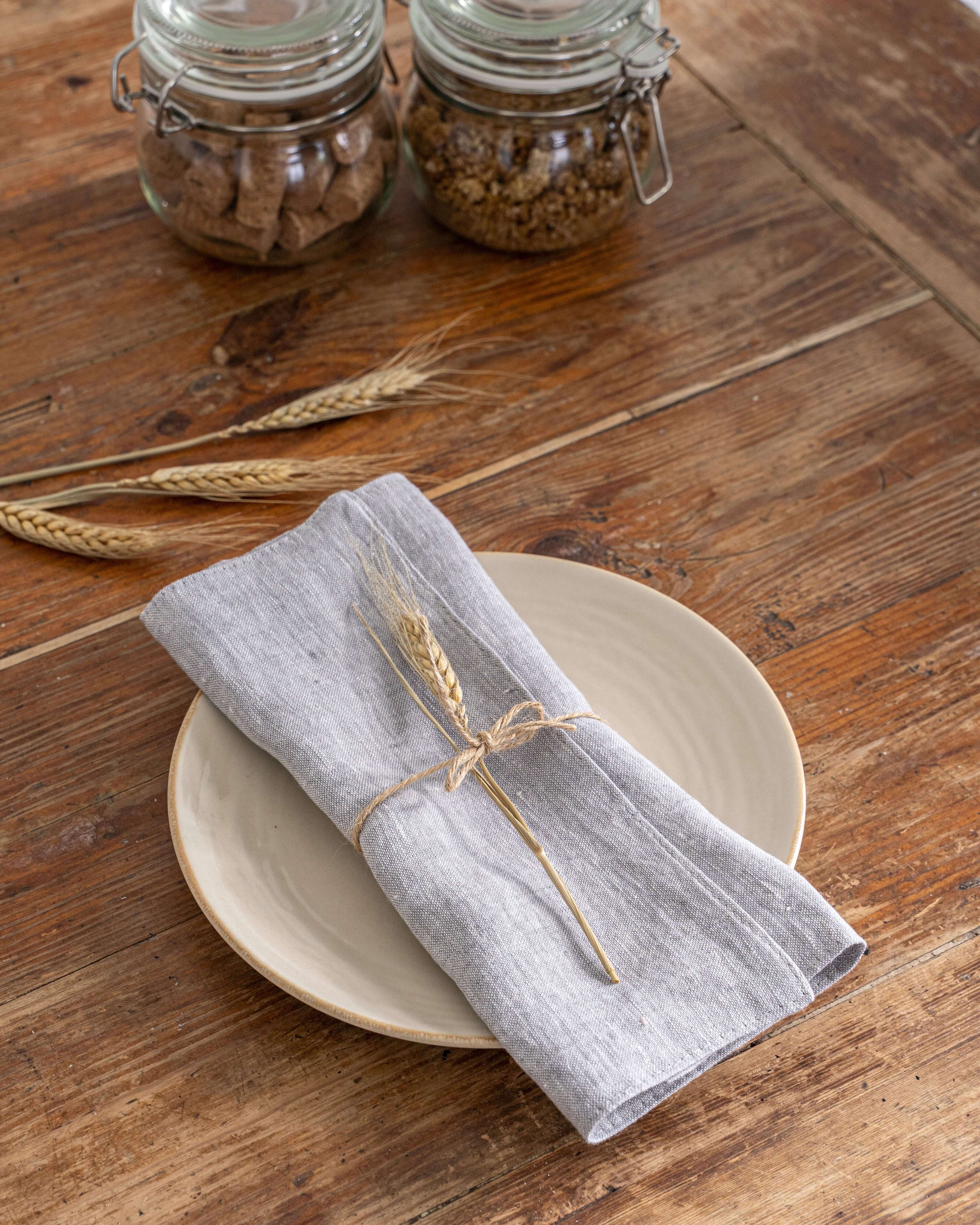 Linen placemats in various colors laid flat, color range