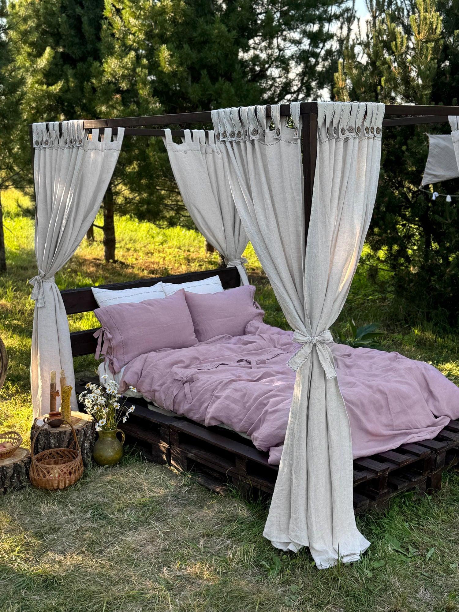 Black embroidered linen bedding set with pillowcases, coordinated look