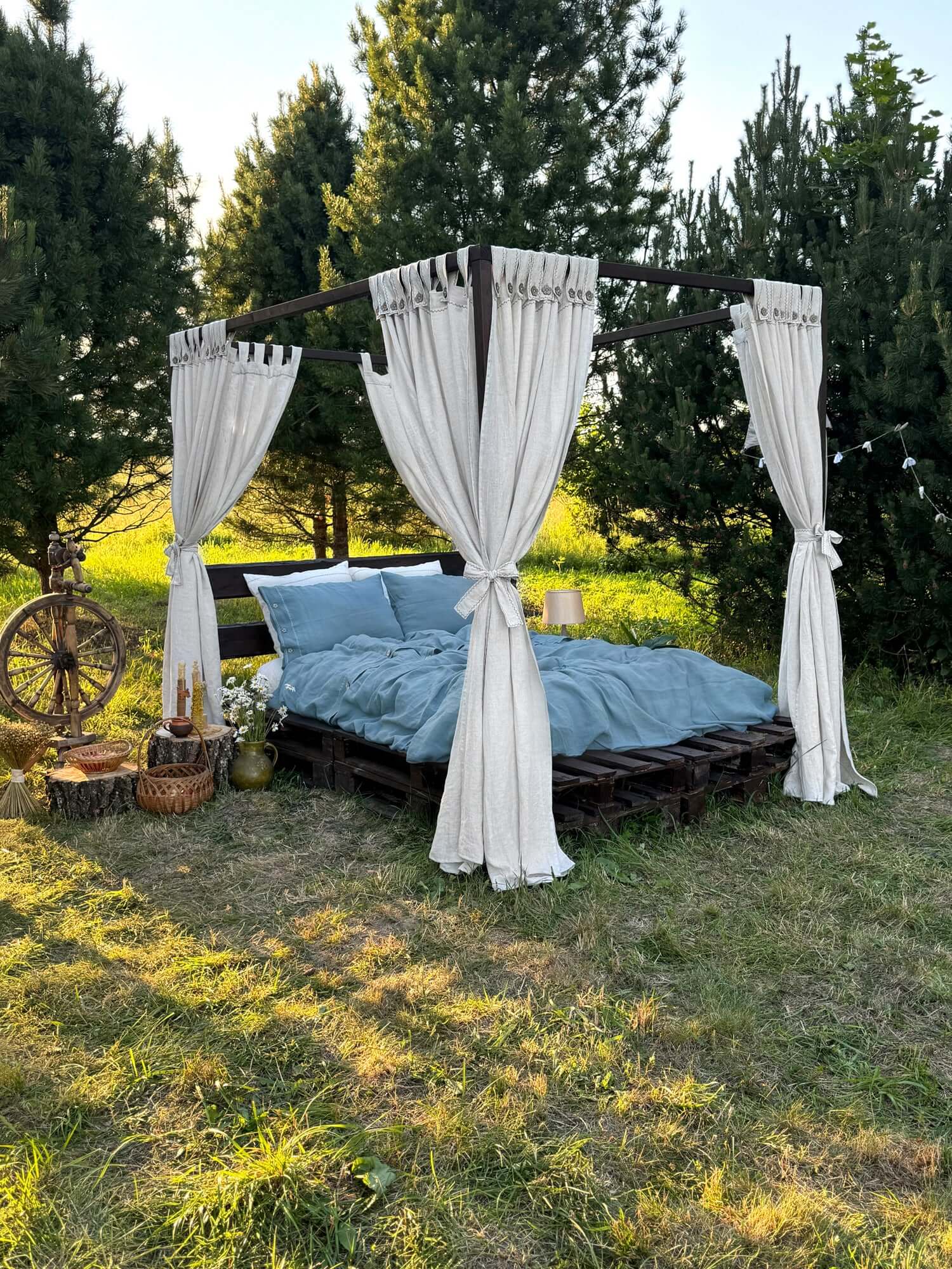 White linen canopy curtains draped on four-poster bed frame, full length view
