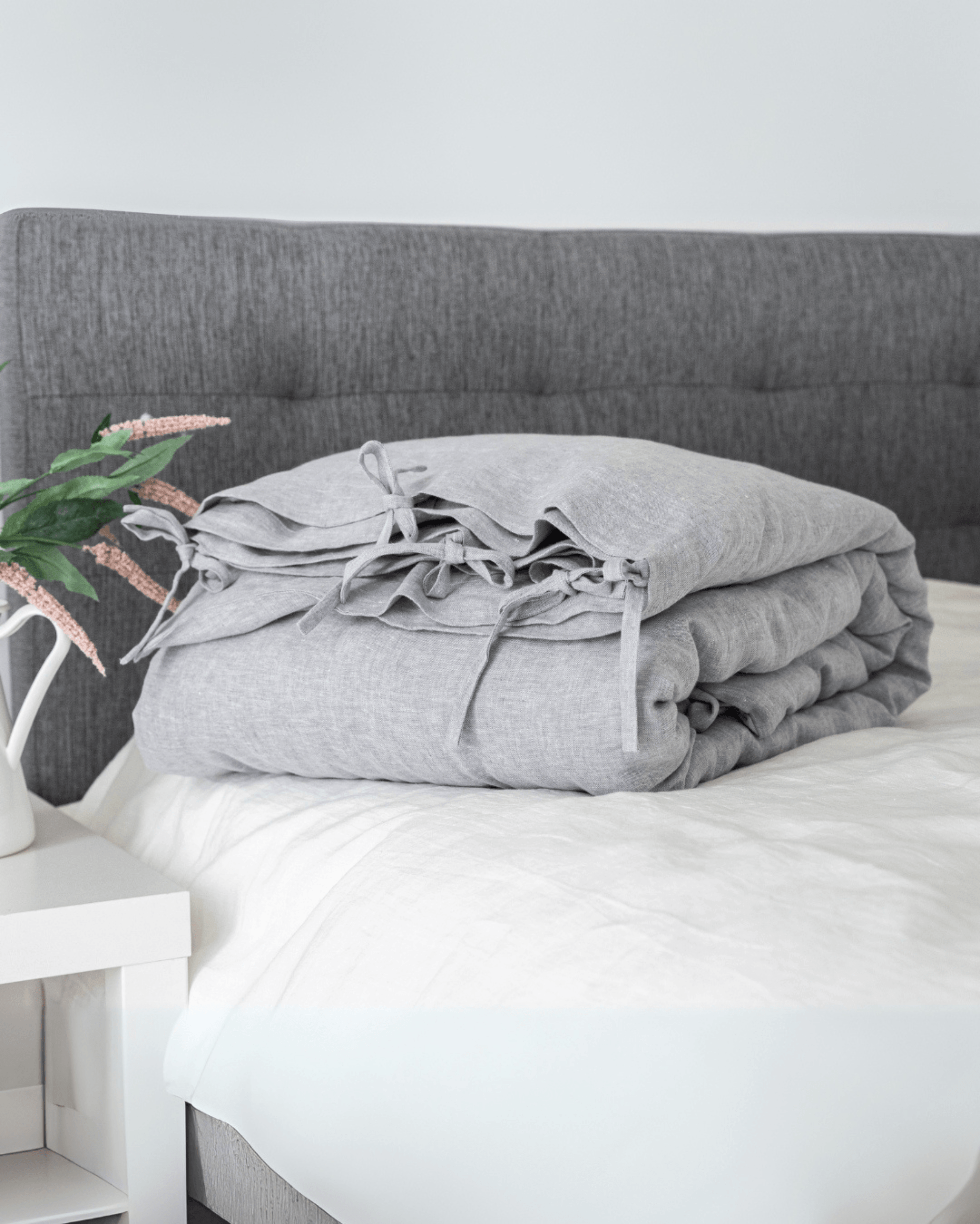 Minimalist linen pillowcases stacked on bed, EU, UK, US size bedding set