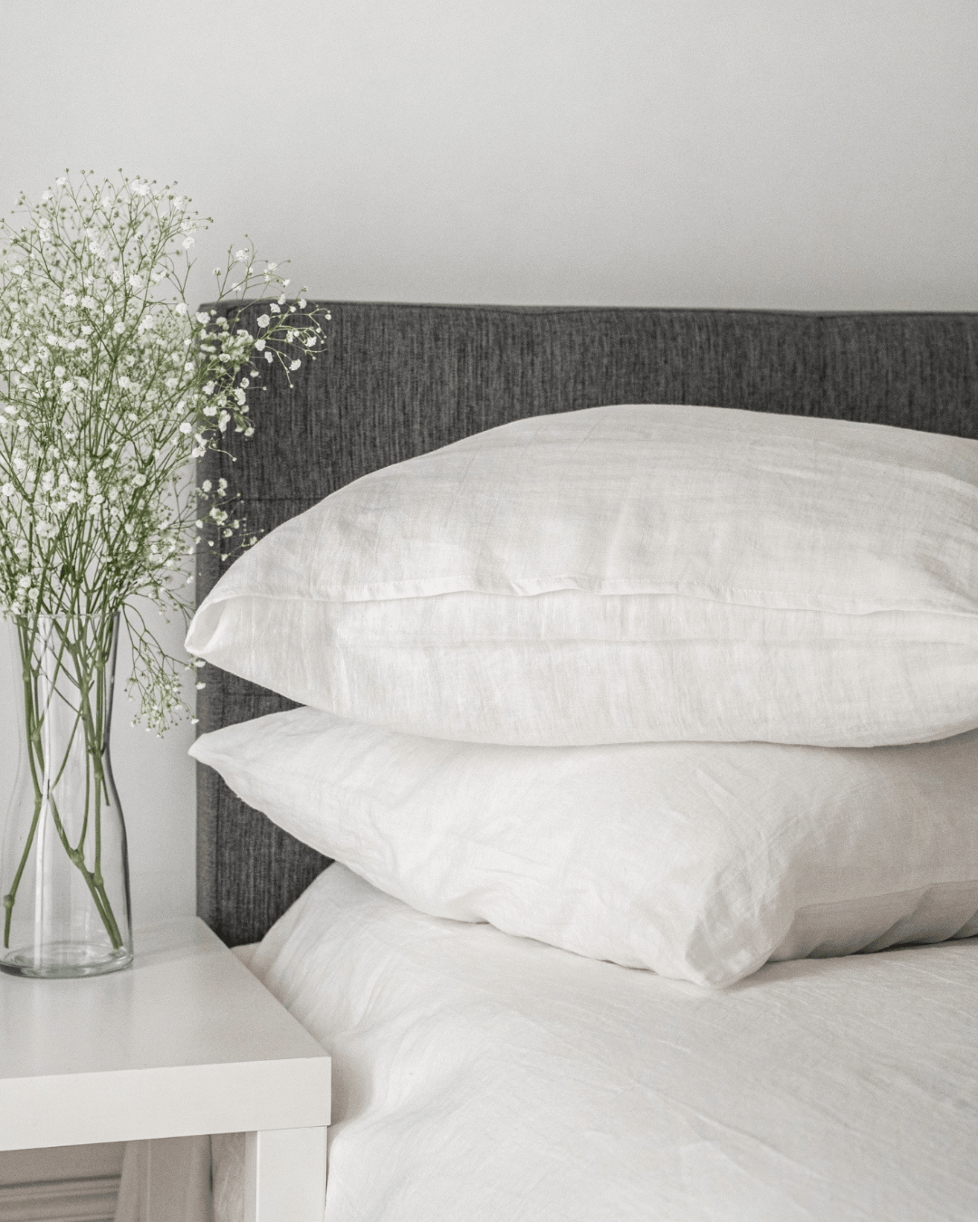 Close-up of minimalist linen pillowcase texture, softened linen surface detail