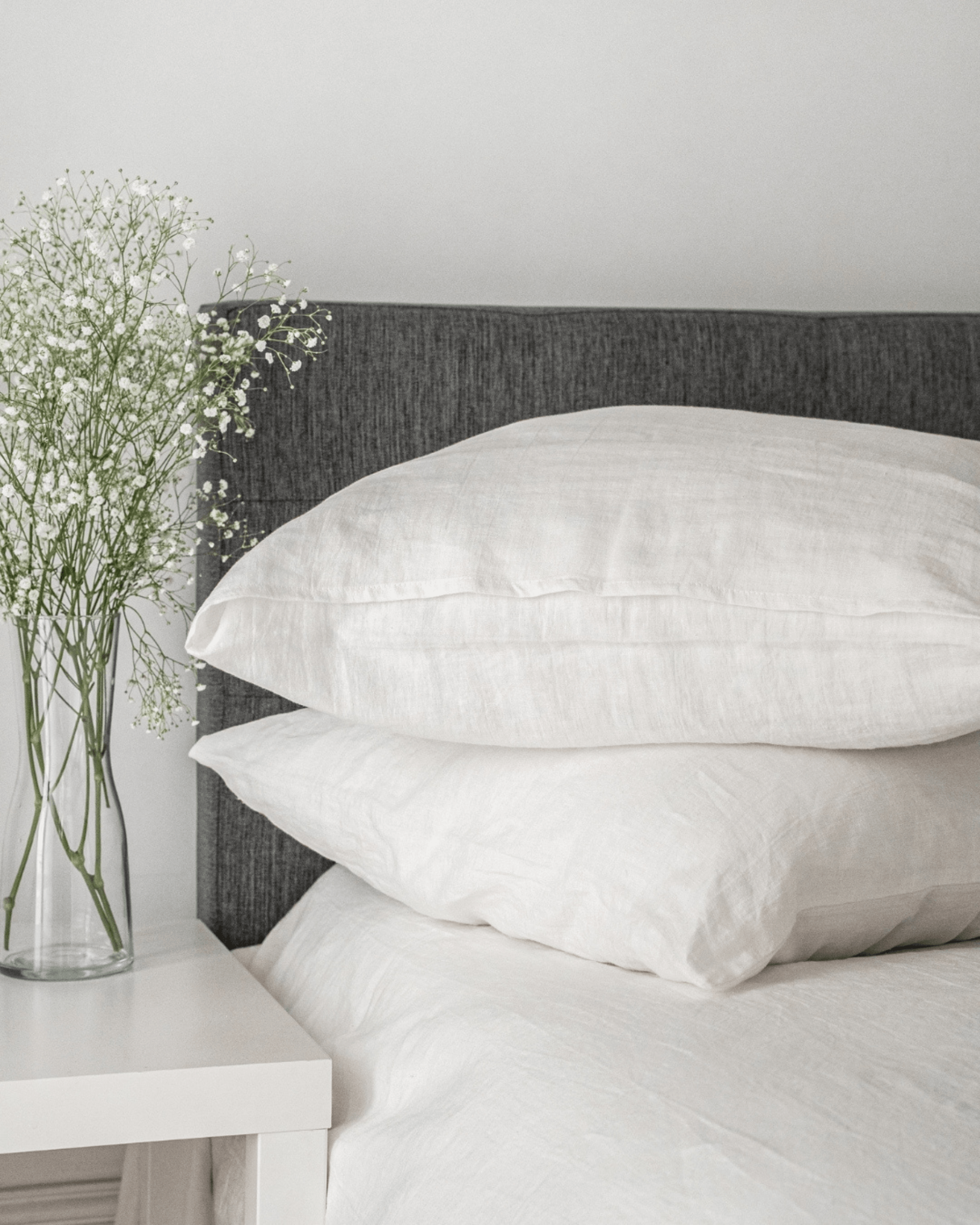 Close-up of minimalist linen pillowcase texture, softened linen surface detail