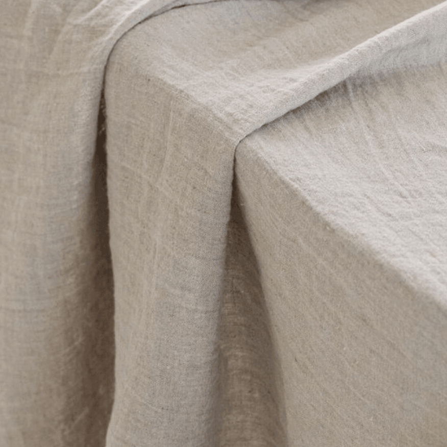Natural linen tablecloth corner detail, 190 g/m² fabric weight