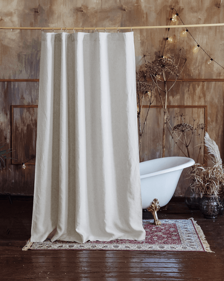 Natural light linen shower curtain with waterproof lining, front view in a bathroom setting.