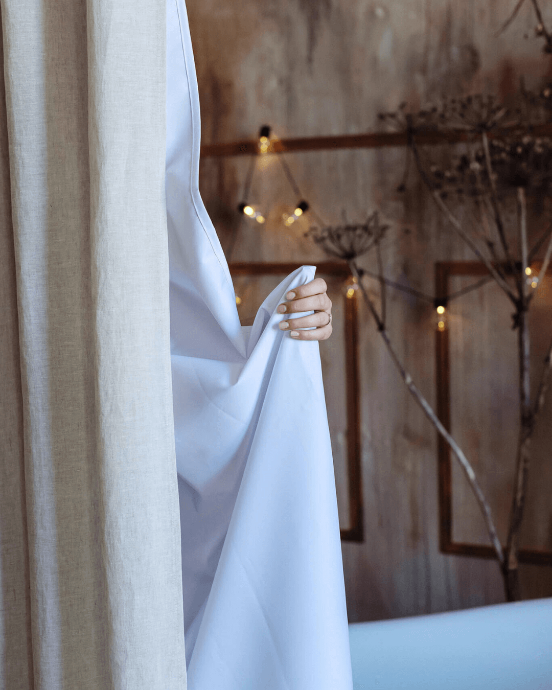Linen shower curtain with waterproof lining, natural light, modern bathroom
