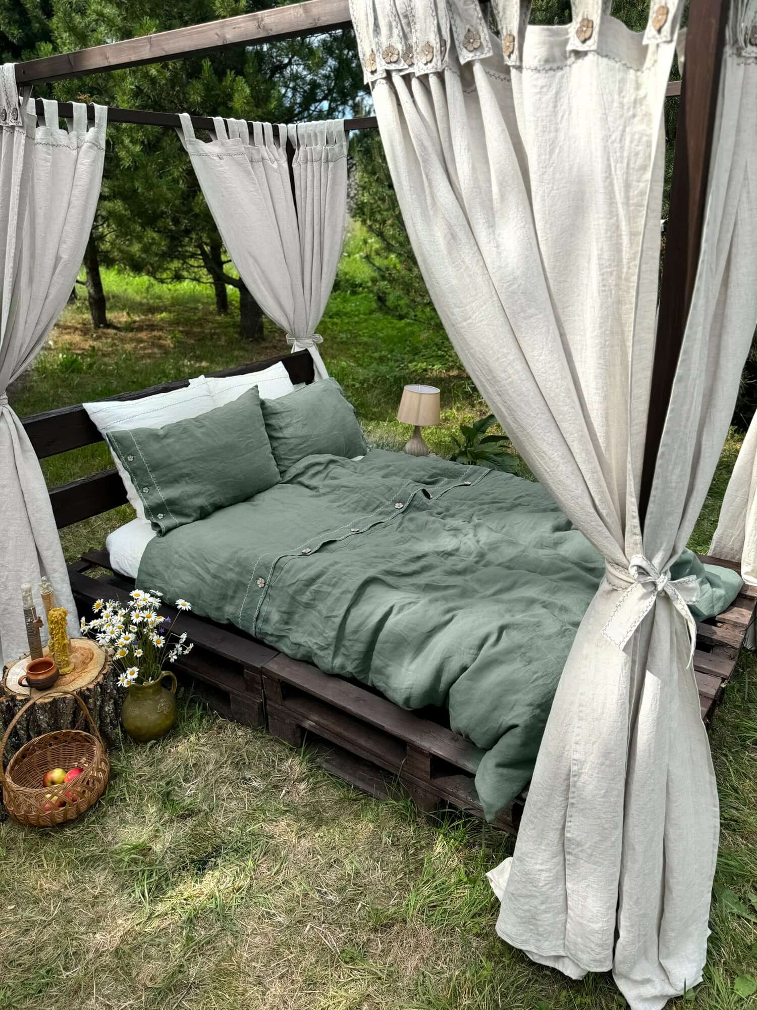 White linen canopy curtains, side view showing tab top detail and drape
