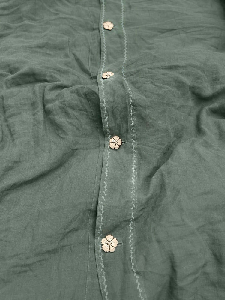 White embroidered linen bedding set styled on bed, EU, UK, US size