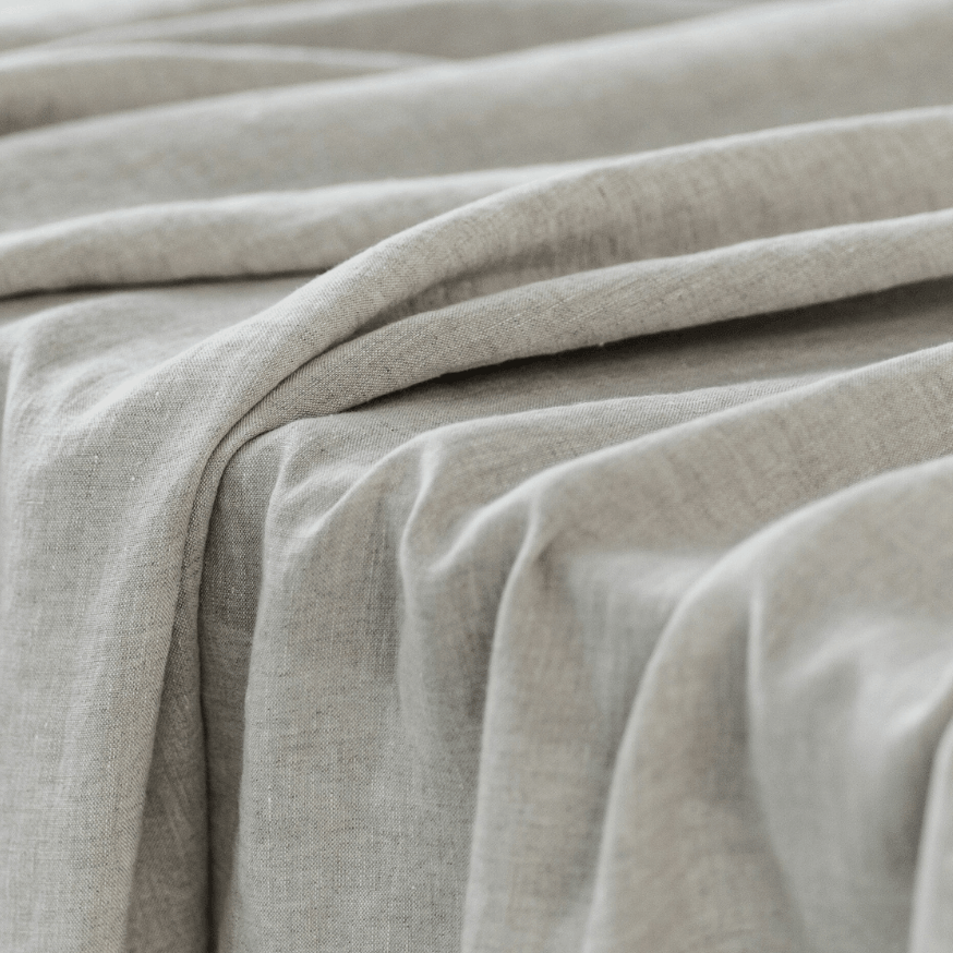 Natural linen fabric drape close-up, 175 g/m² softened texture