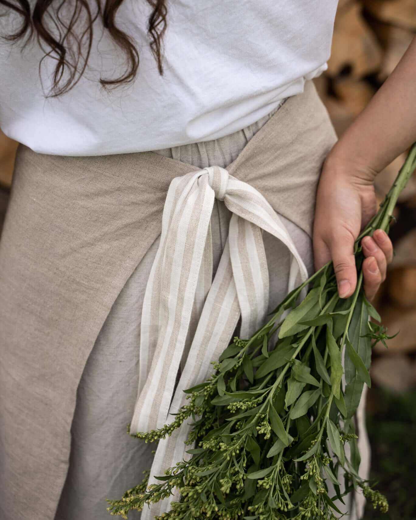 Linen half apron worn outdoors, lifestyle photo