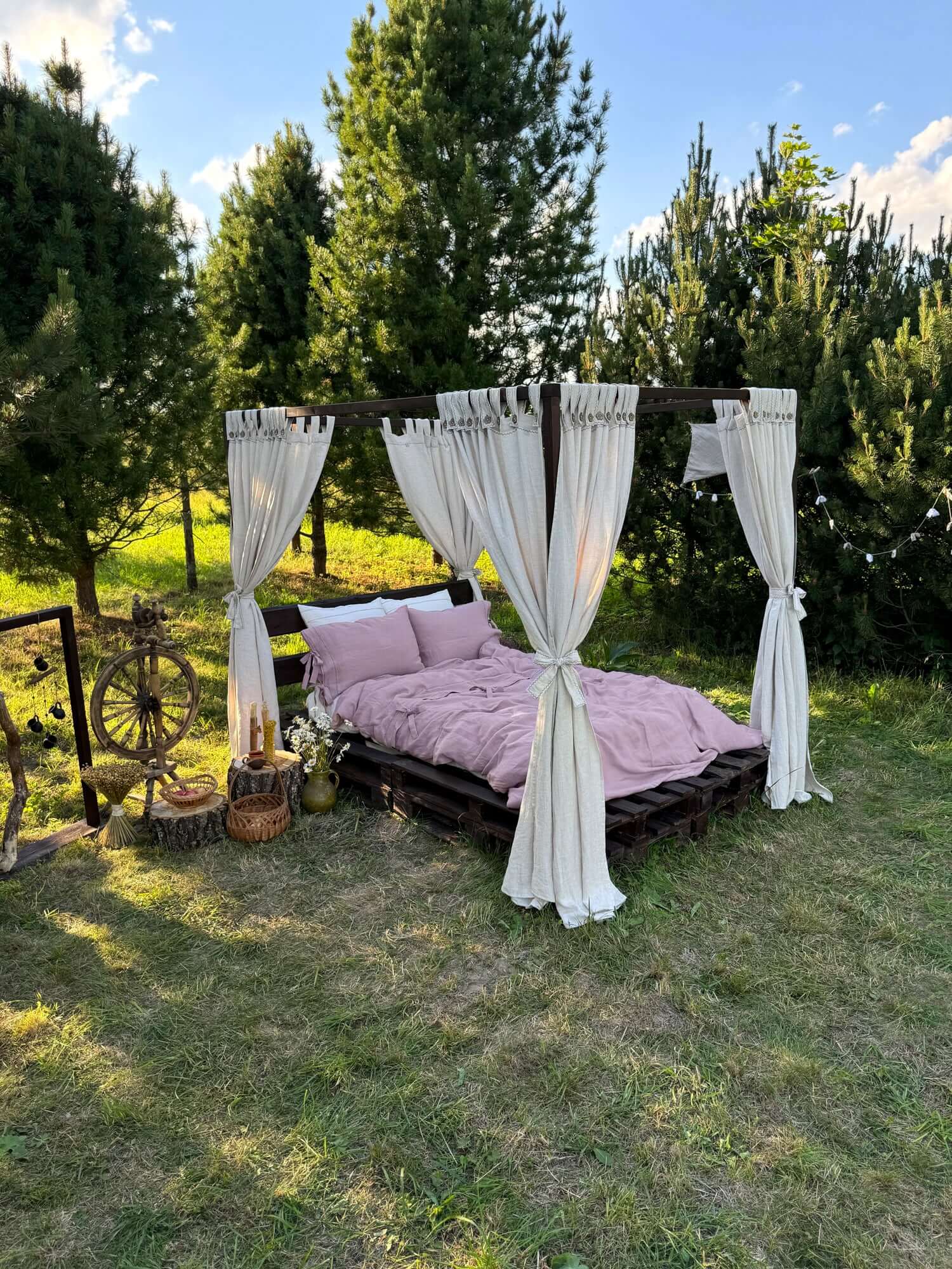 Button tab linen canopy curtains on four-poster bed, lifestyle photo