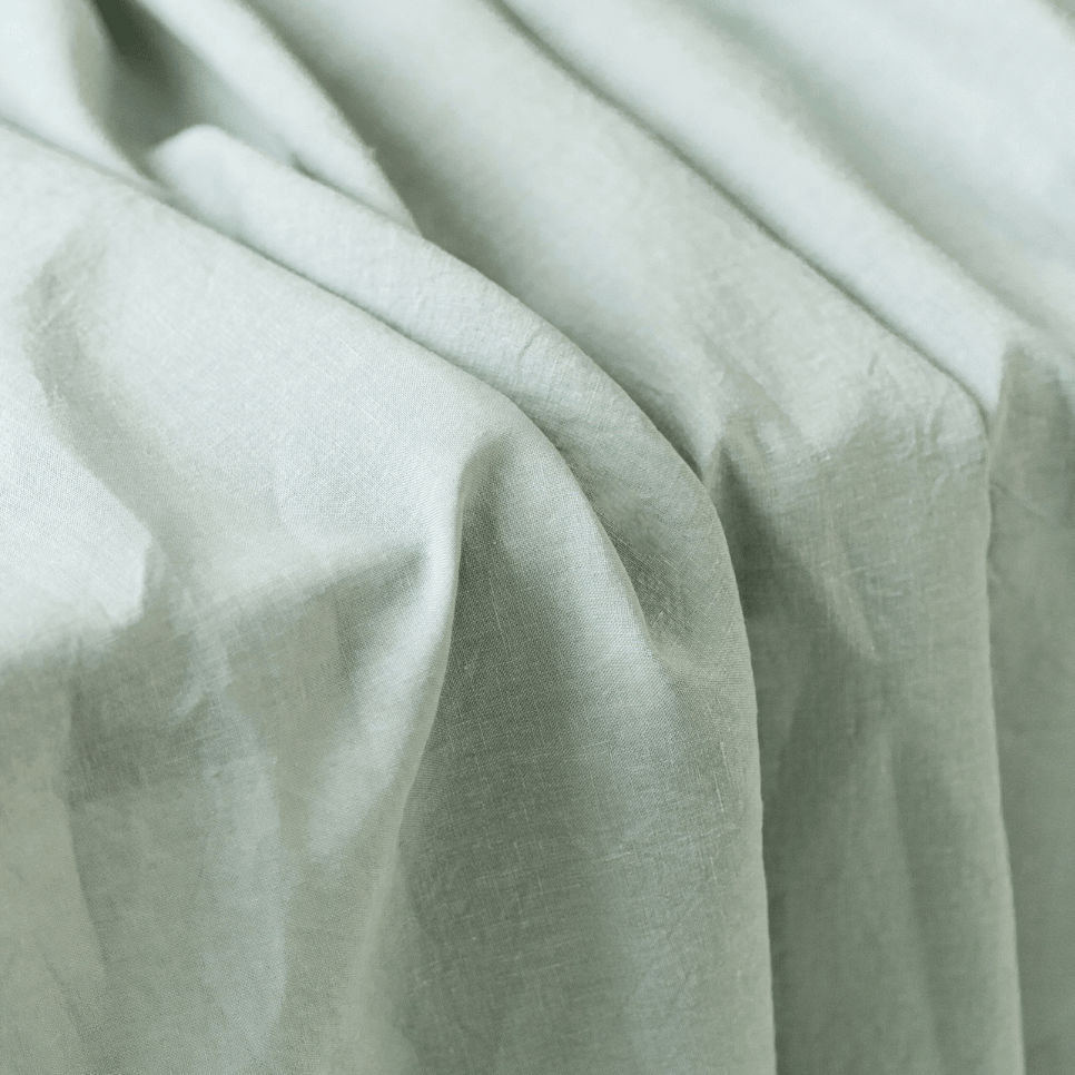 Sage green linen fabric drape, 175 g/m² softened texture