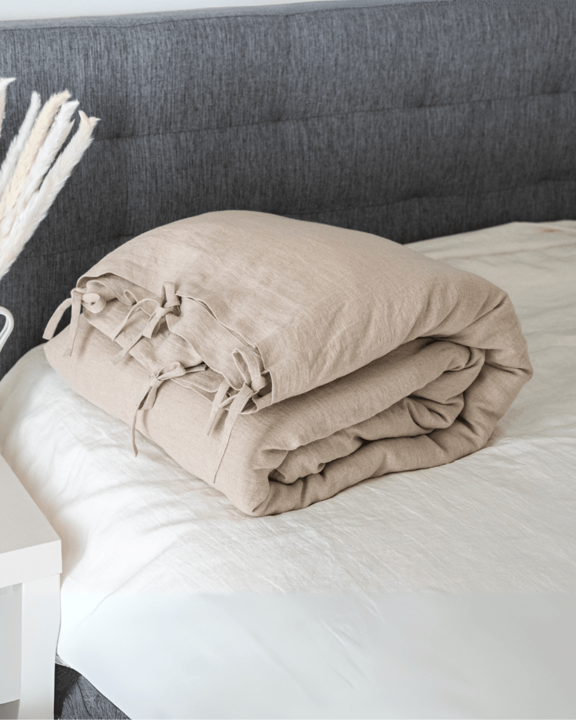 Minimalist linen bedding set close-up, bottom closure detail, EU, UK, US size