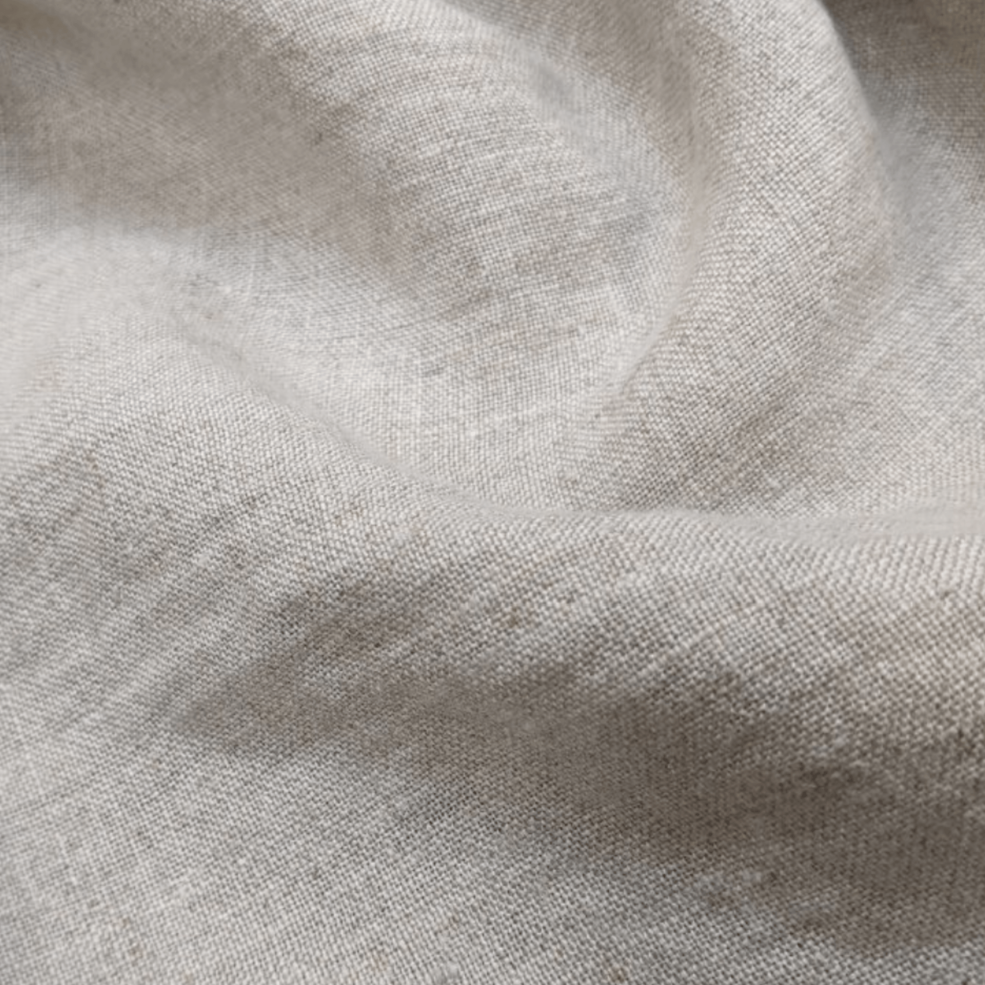 Softened linen fabric close-up showing natural weave and texture