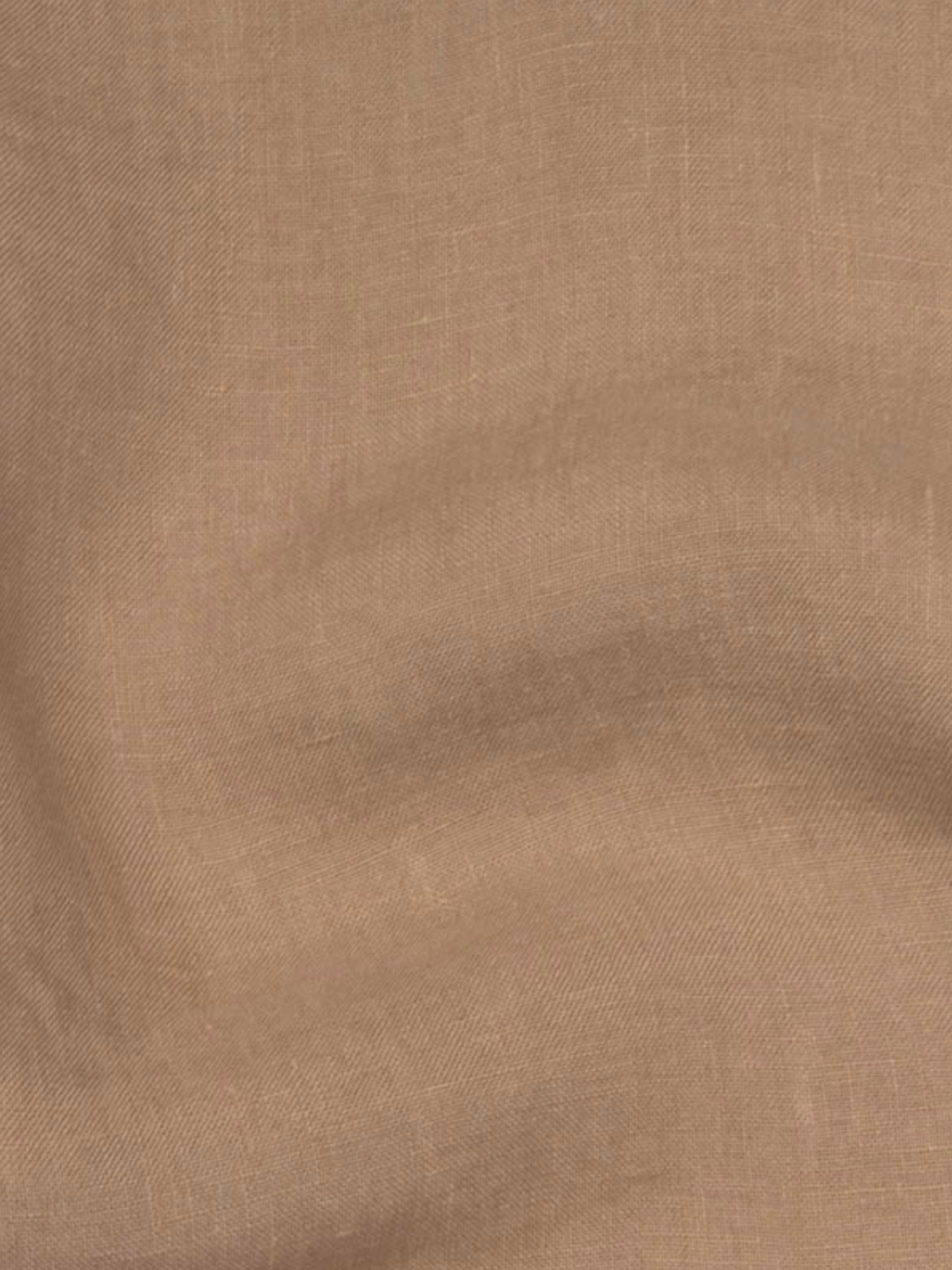 a brown fabric with a white background