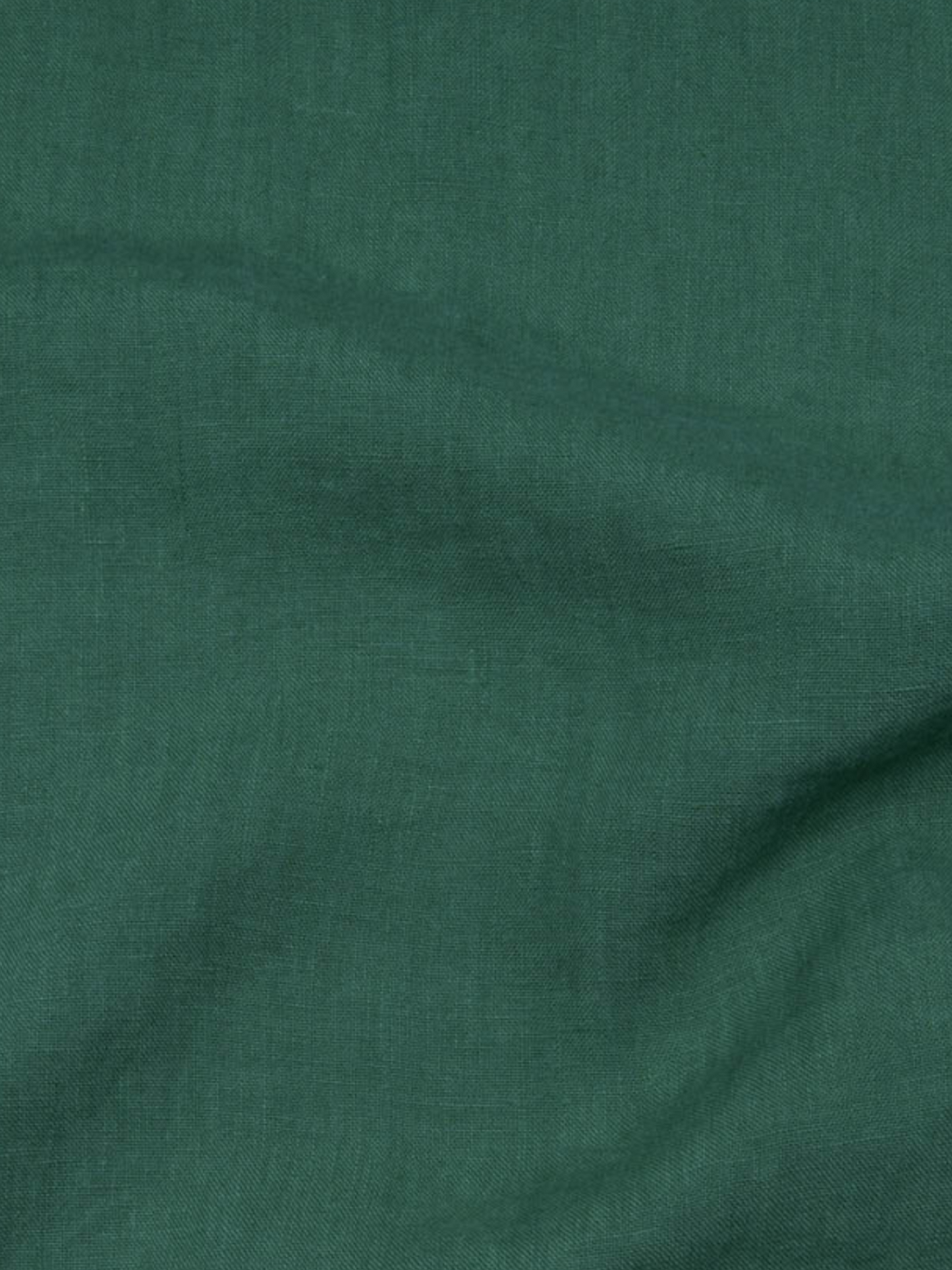 Seamless linen couch cover in Emerald Green color (density 175 g/m2)