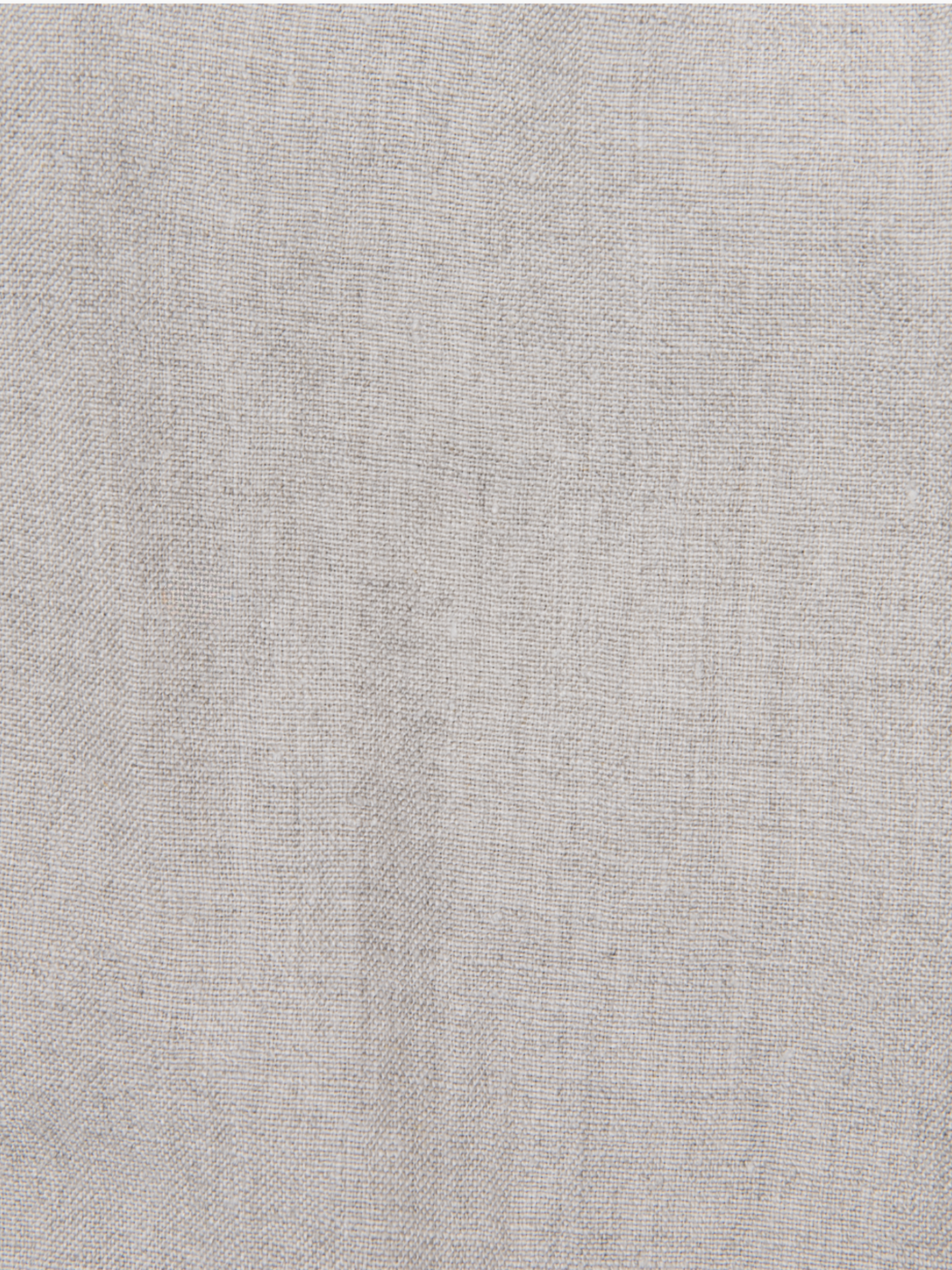 a close up of a white cloth textured background