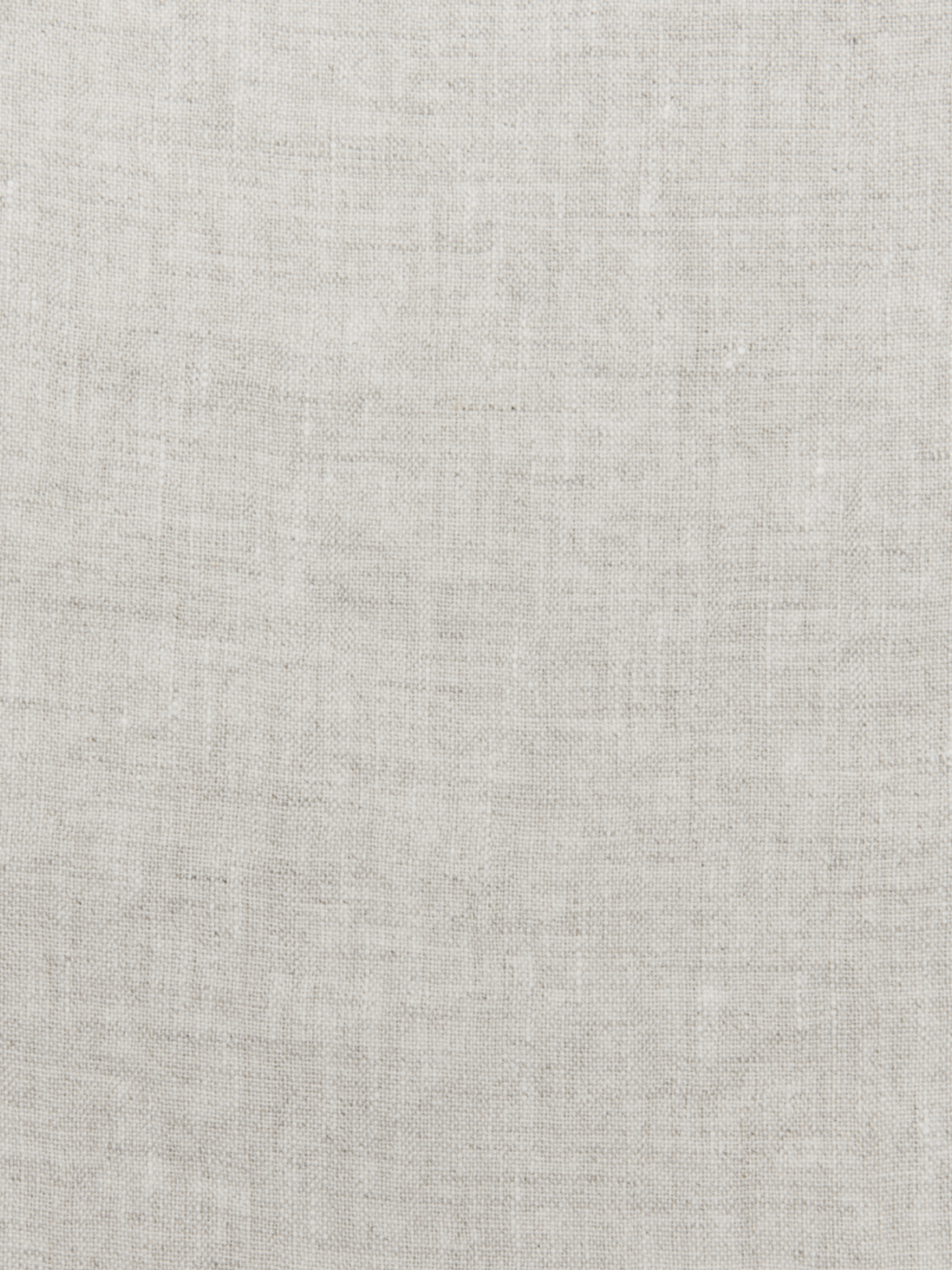 a white cloth textured with a pattern