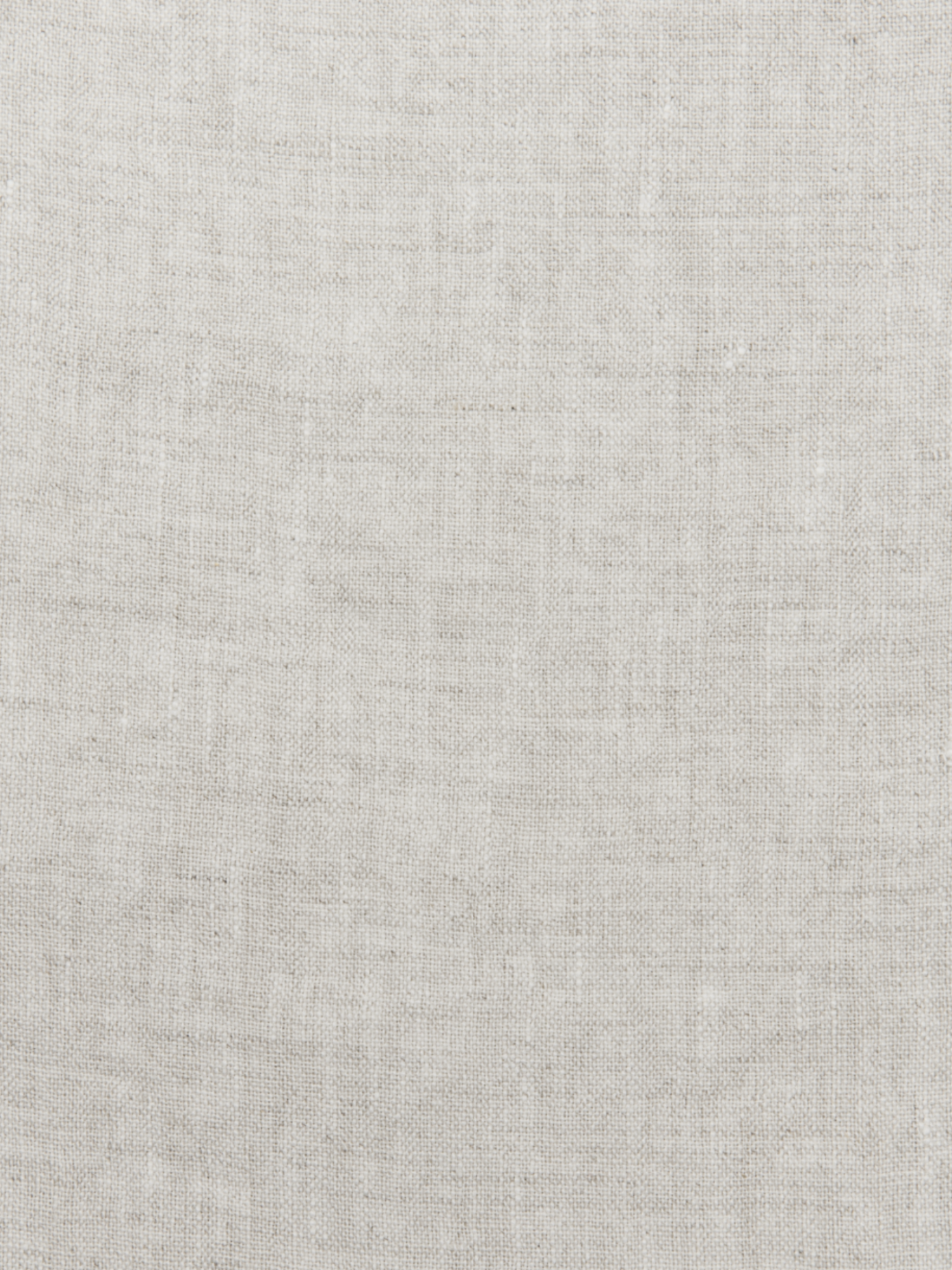 a white cloth textured with a pattern