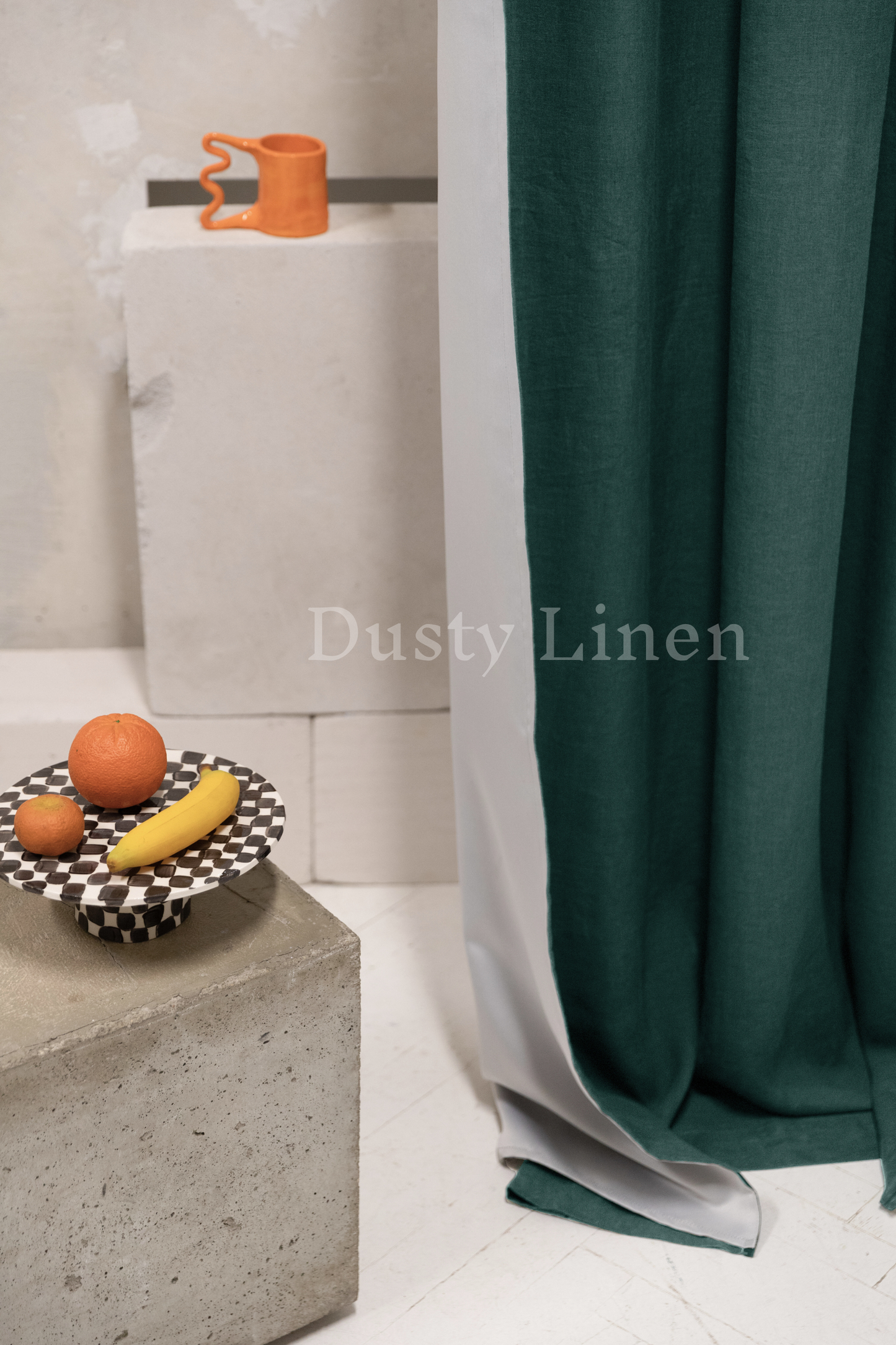 a bowl of fruit sitting on top of a cement block