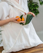 Large linen tote bag in natural color, front view, softened linen