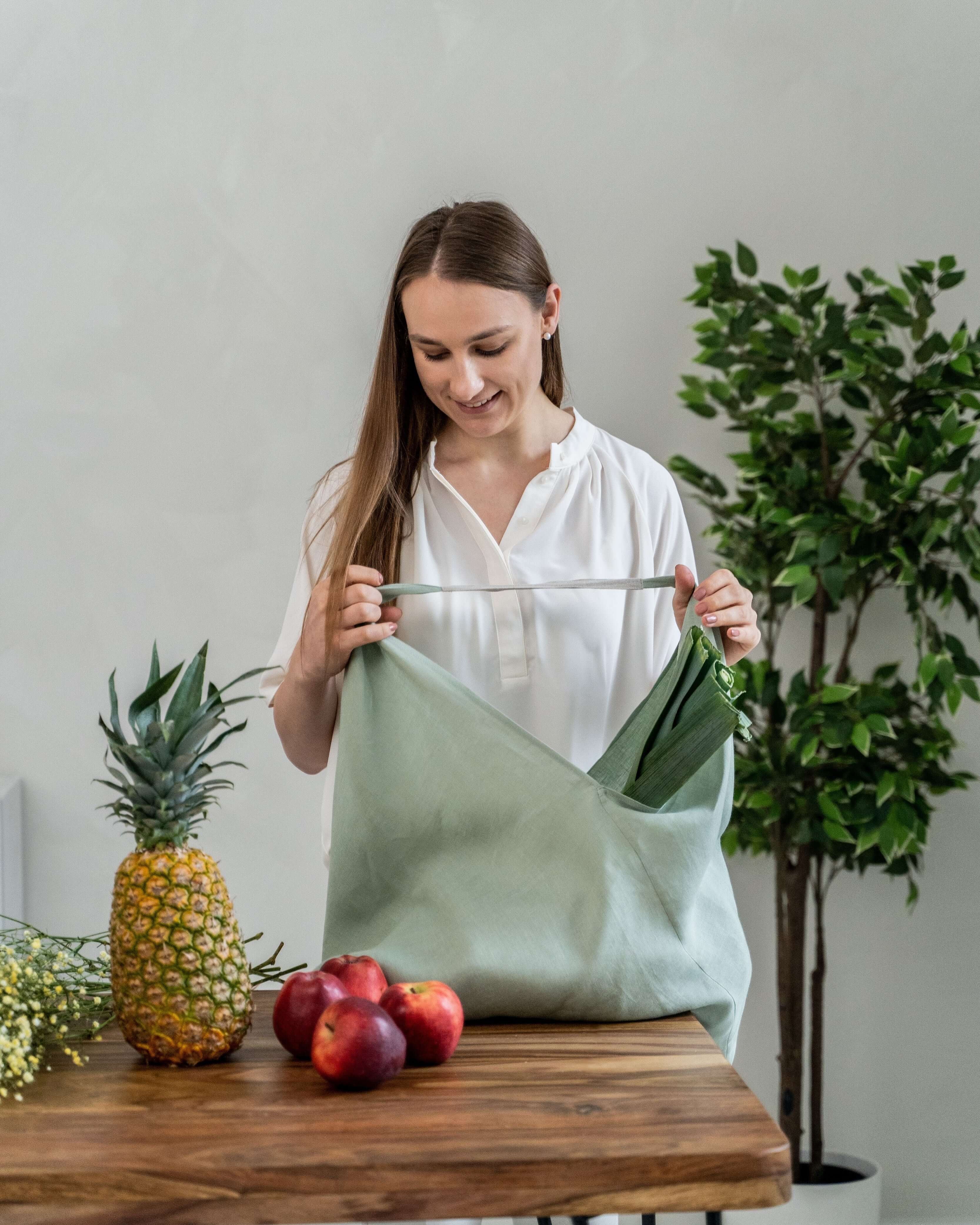 Large linen tote bag in various colors laid flat, color range view