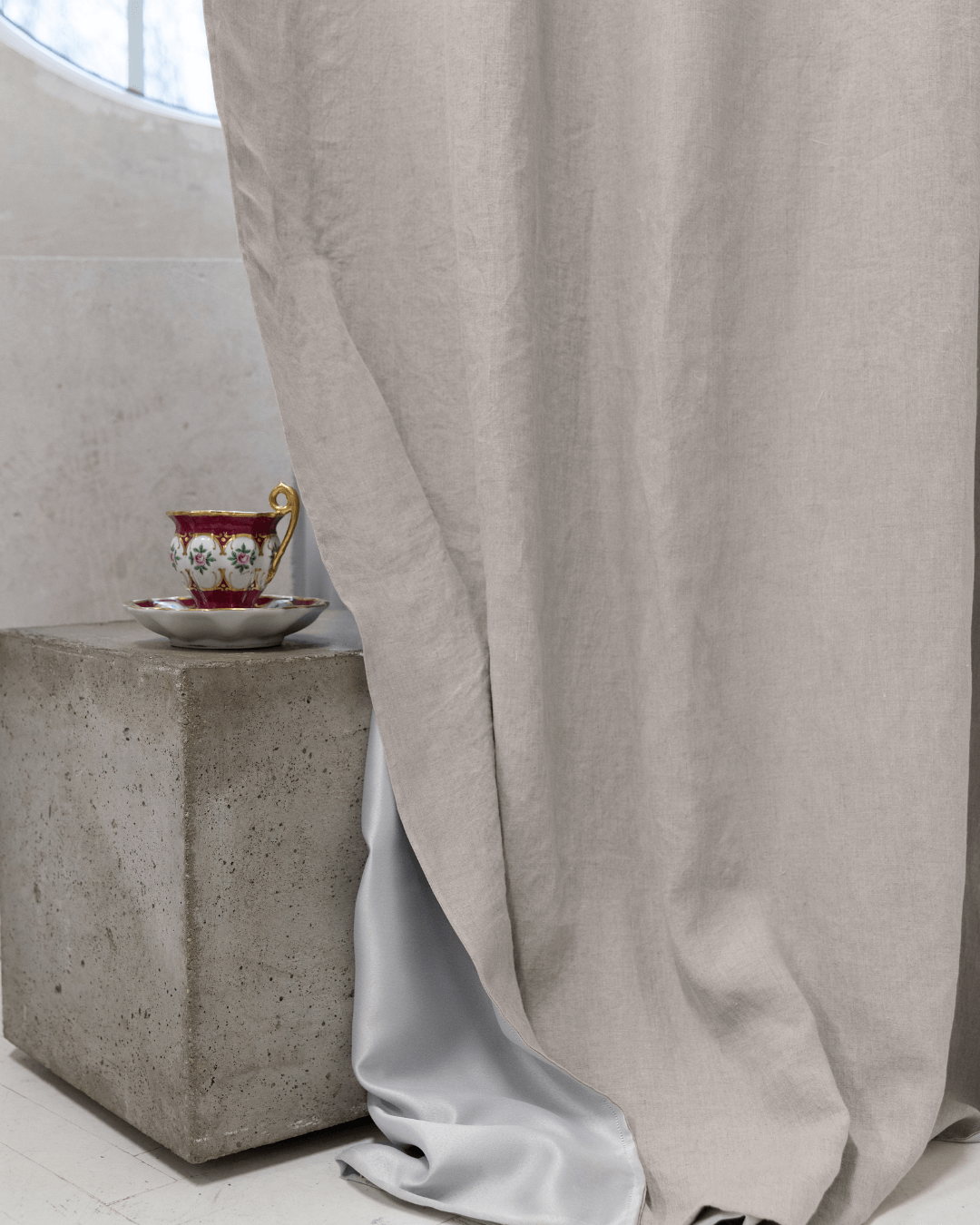 Natural light linen blackout curtains with cup and saucer, styled interior