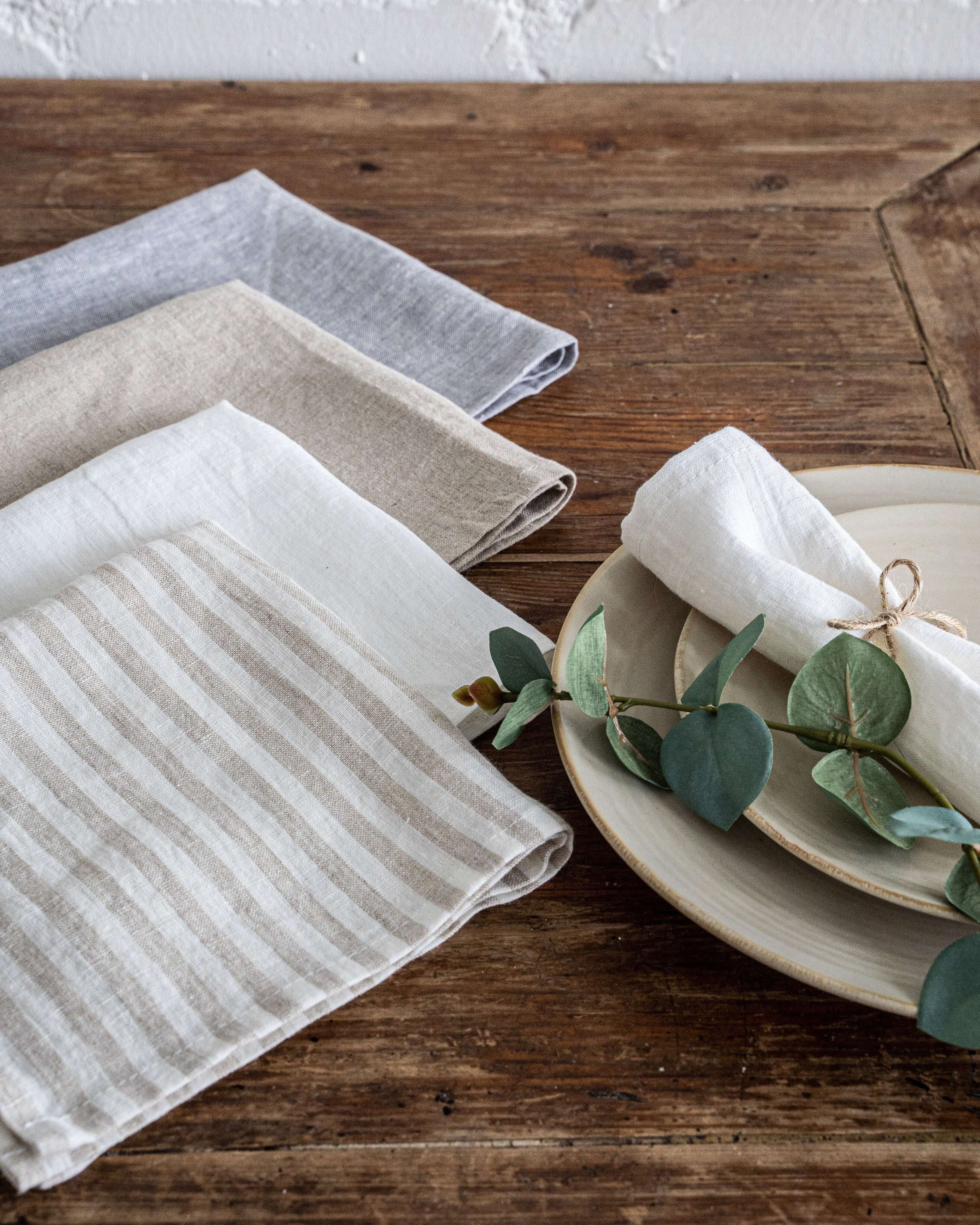 Linen placemats folded showing color and weave detail