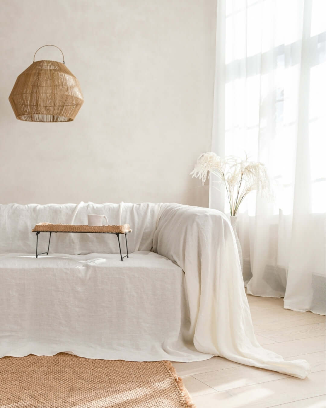 Off white linen couch cover custom size on sofa in living room