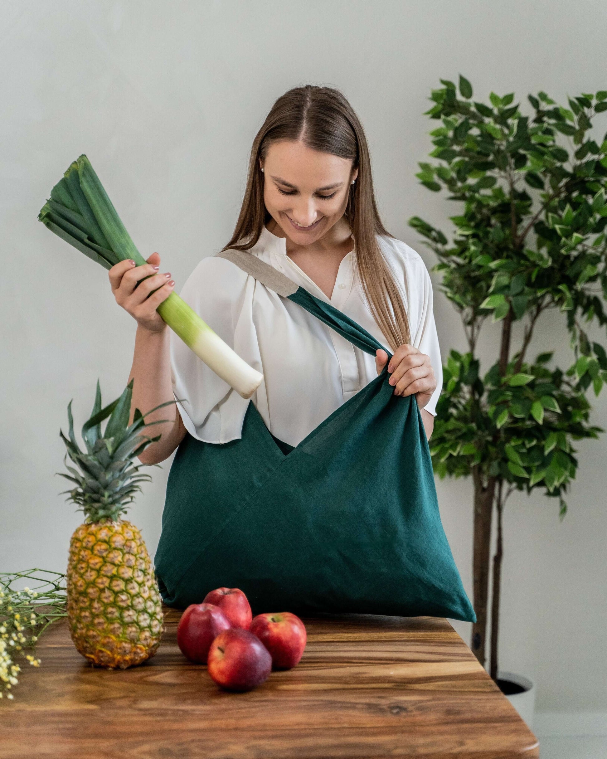 Large linen tote bag styled with contents, showing capacity