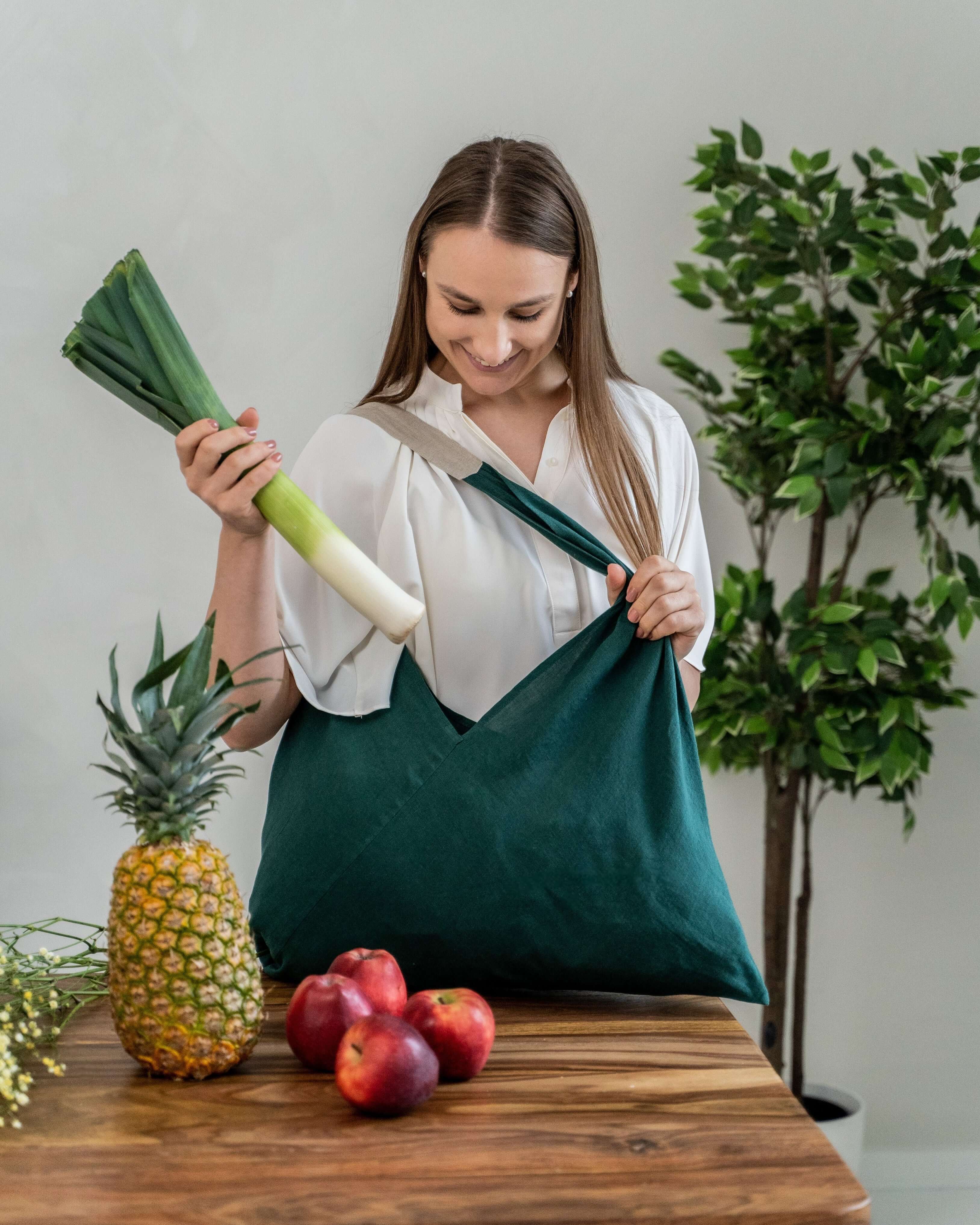 Large linen tote bag styled with contents, showing capacity
