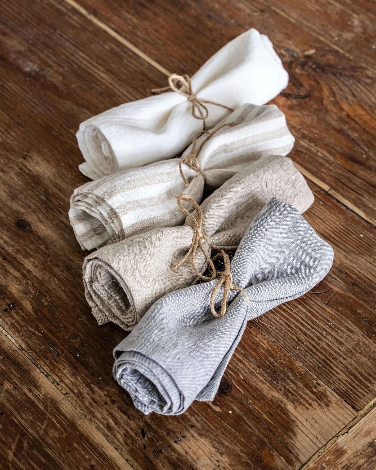 Linen placemats stacked, softened linen texture close-up